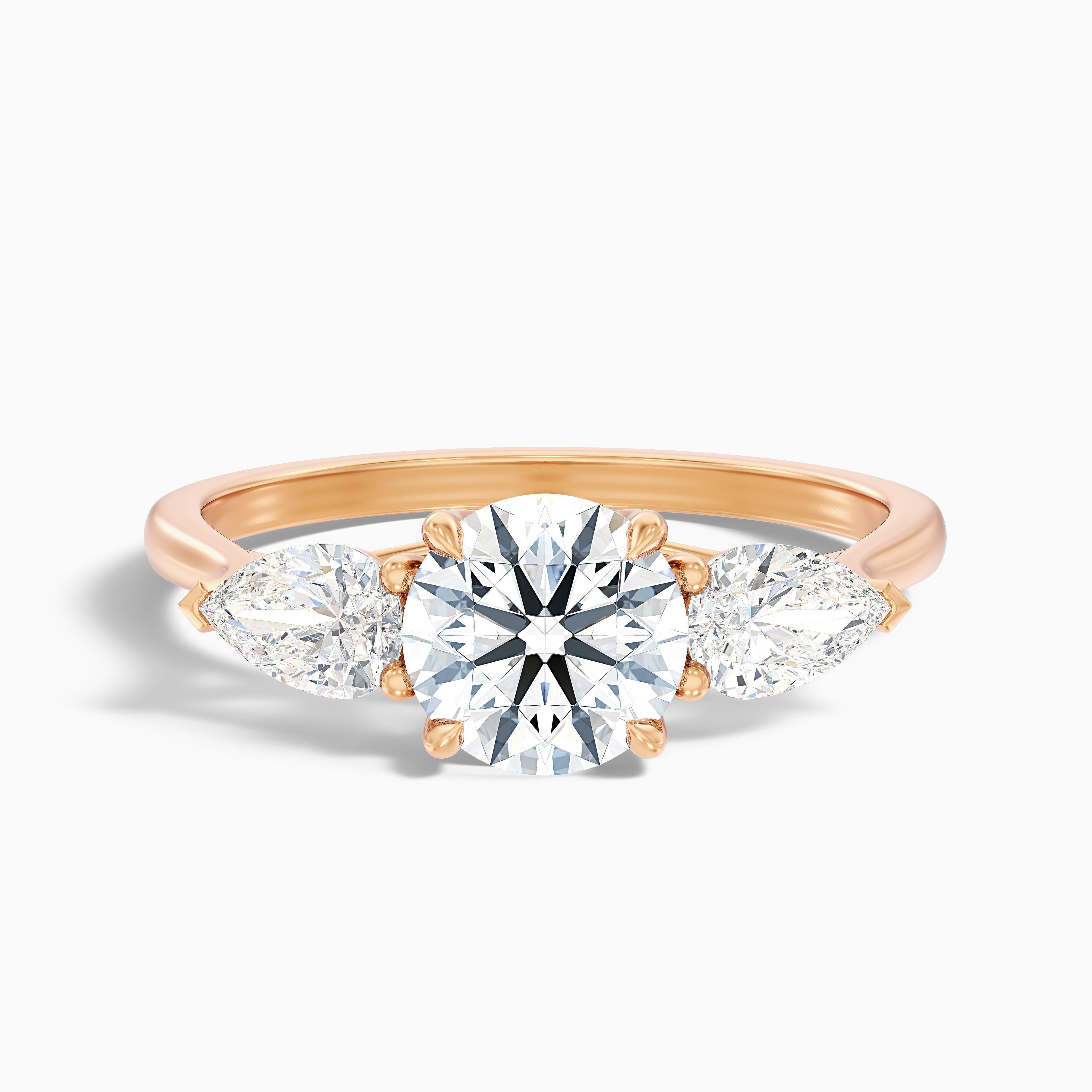 Amaya 1.5 Carat Round 3 Stone Moissanite Diamond Ring With Pear Side Stone in 18k Rose Gold