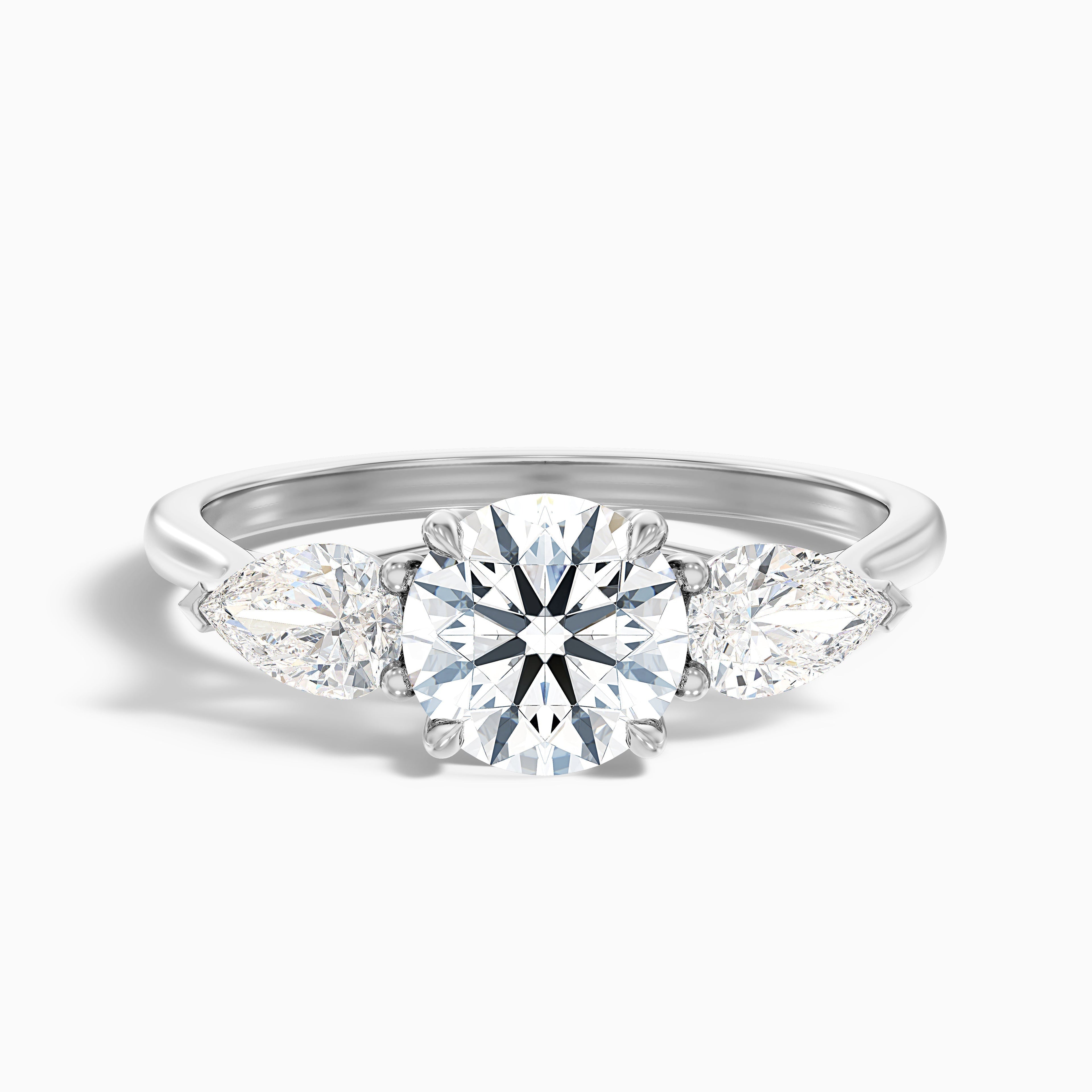 Amaya 1.5 Carat Round 3 Stone Moissanite Diamond Ring With Pear Side Stone in 14k Rose Gold DestGlow