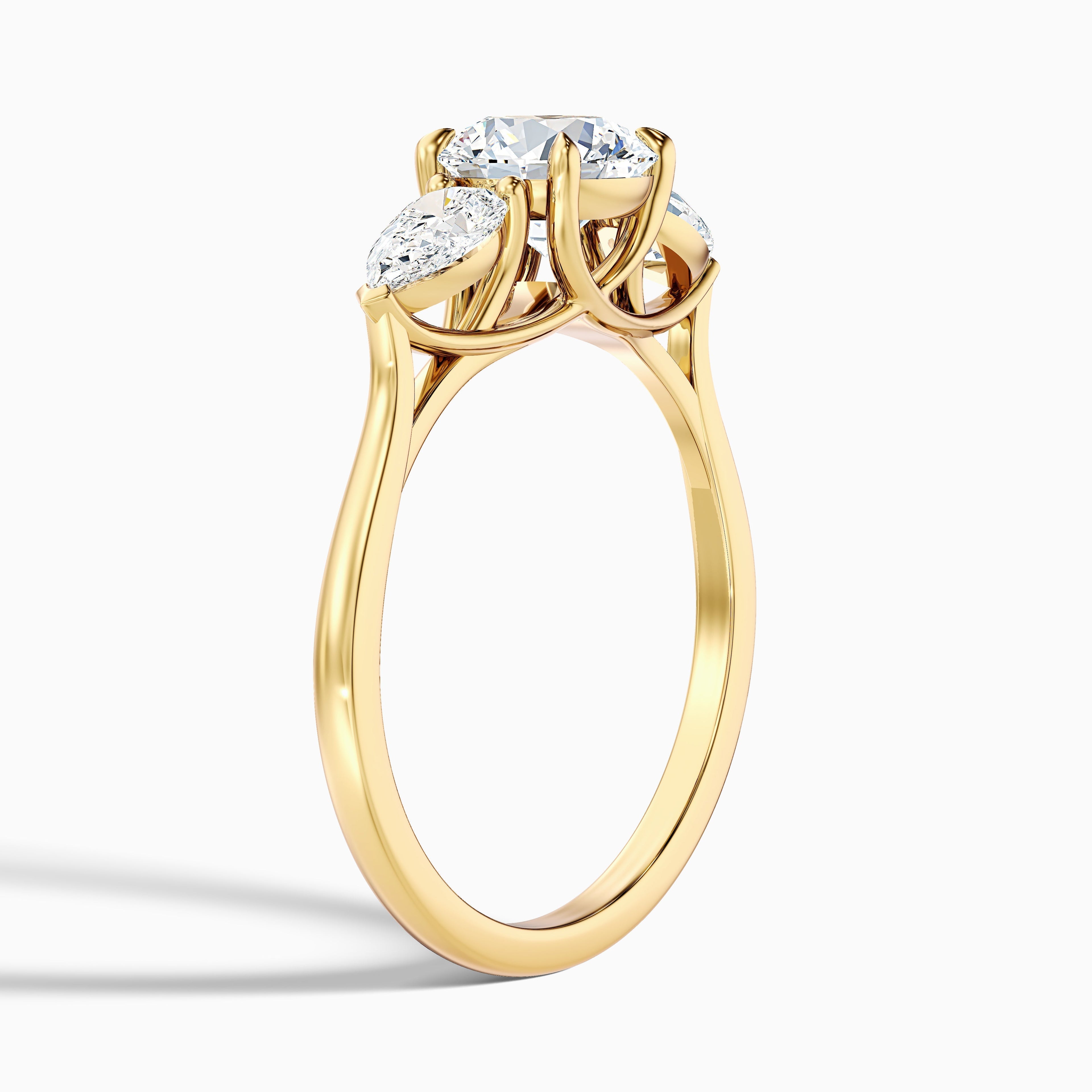 Amaya 3.5 Carat Round 3 Stone Moissanite Diamond Ring With Pear Side Stone in 10k Yellow Gold