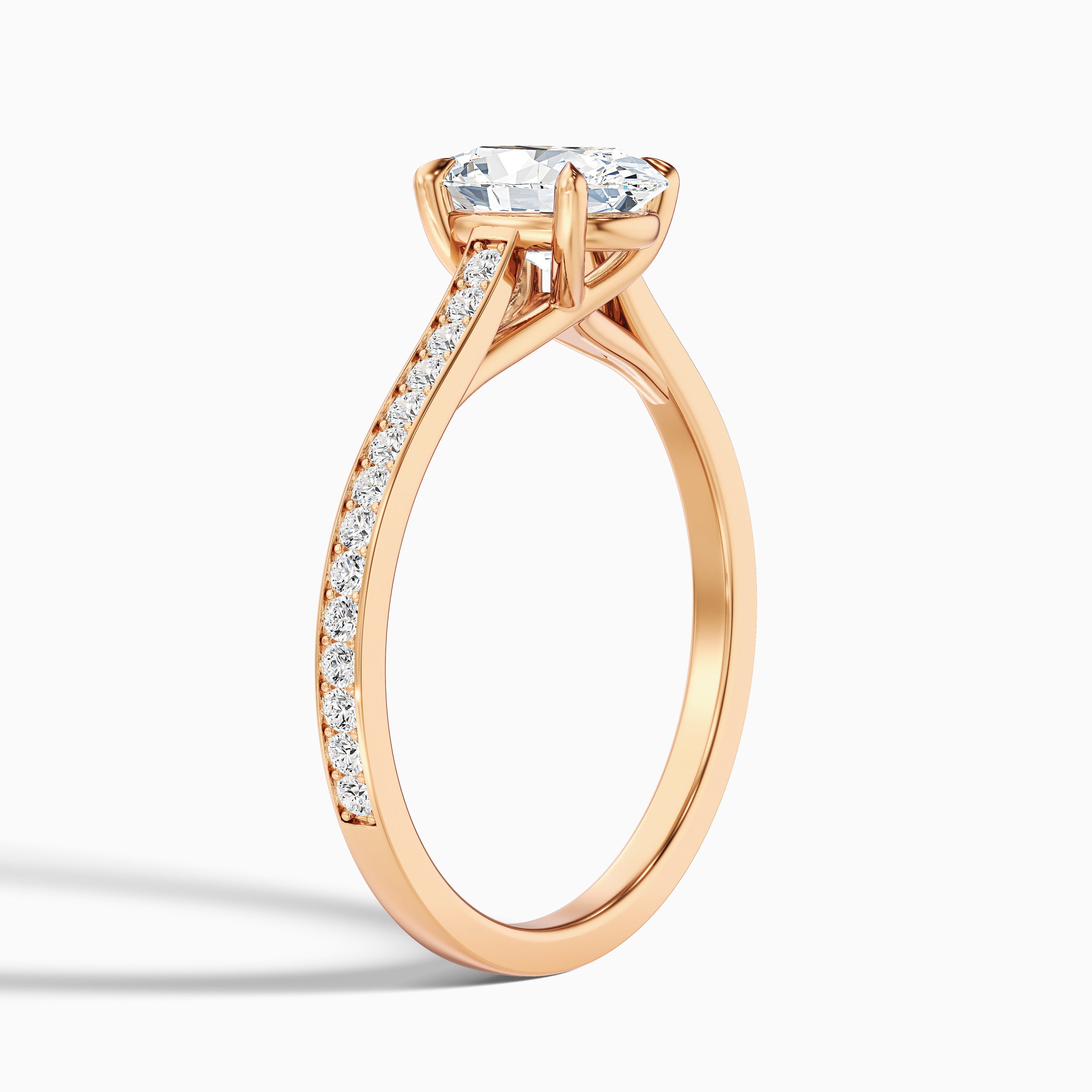 Carla 1 Carat Oval Cut Side Stone Pave Moissanite Diamond Ring in 10k Rose Gold