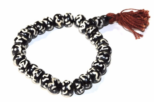 Om Bone Mala Yoga Bracelet - Black White Sanskrit Meditation Bracelet with Tassel