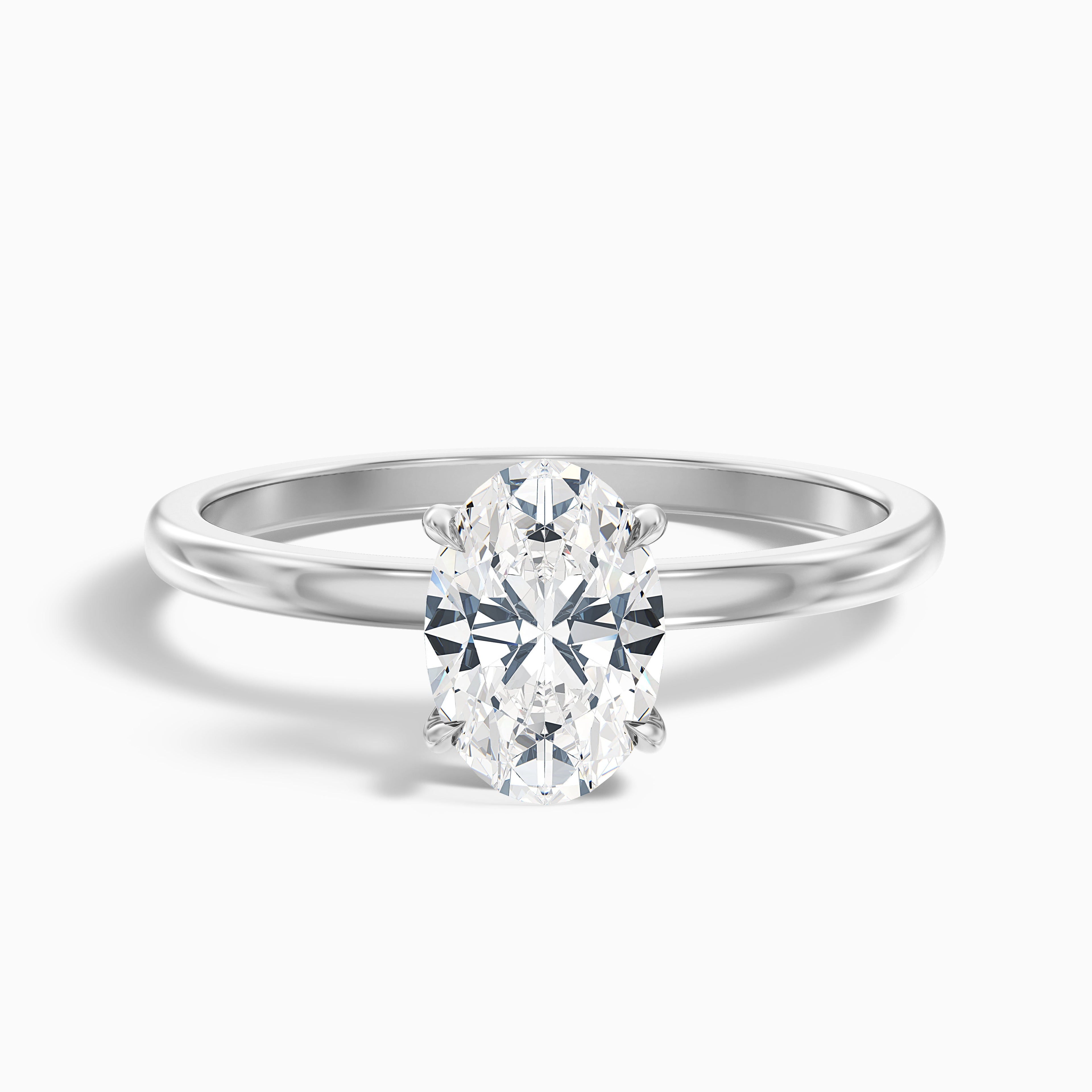 Jade 2 Carat Oval Cut Solitaire Moissanite Diamond Ring in 10k Yellow Gold