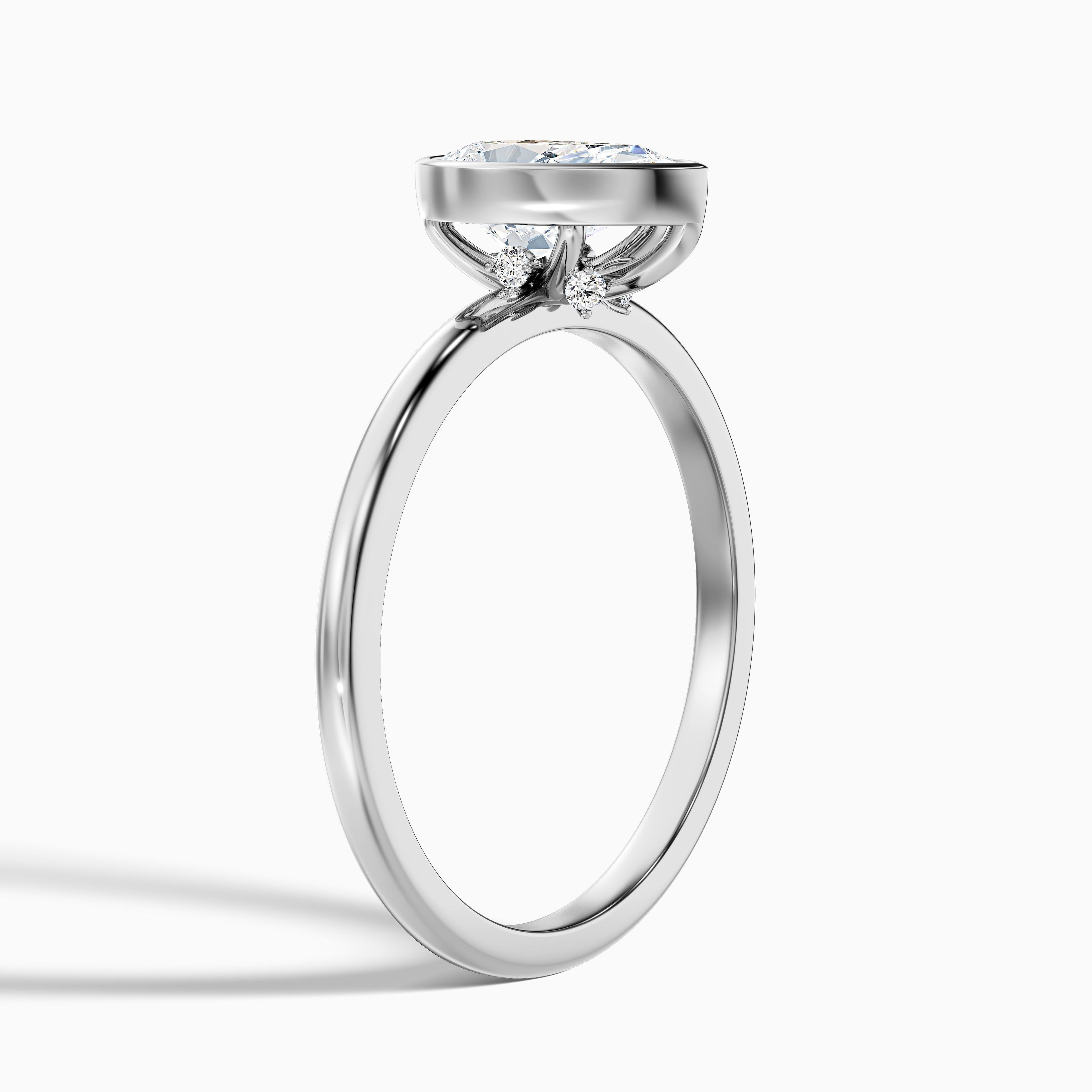 Nasya 1.5 Carat Pear Cut Bezel Set Moissanite Diamond Ring in 18k Yellow Gold