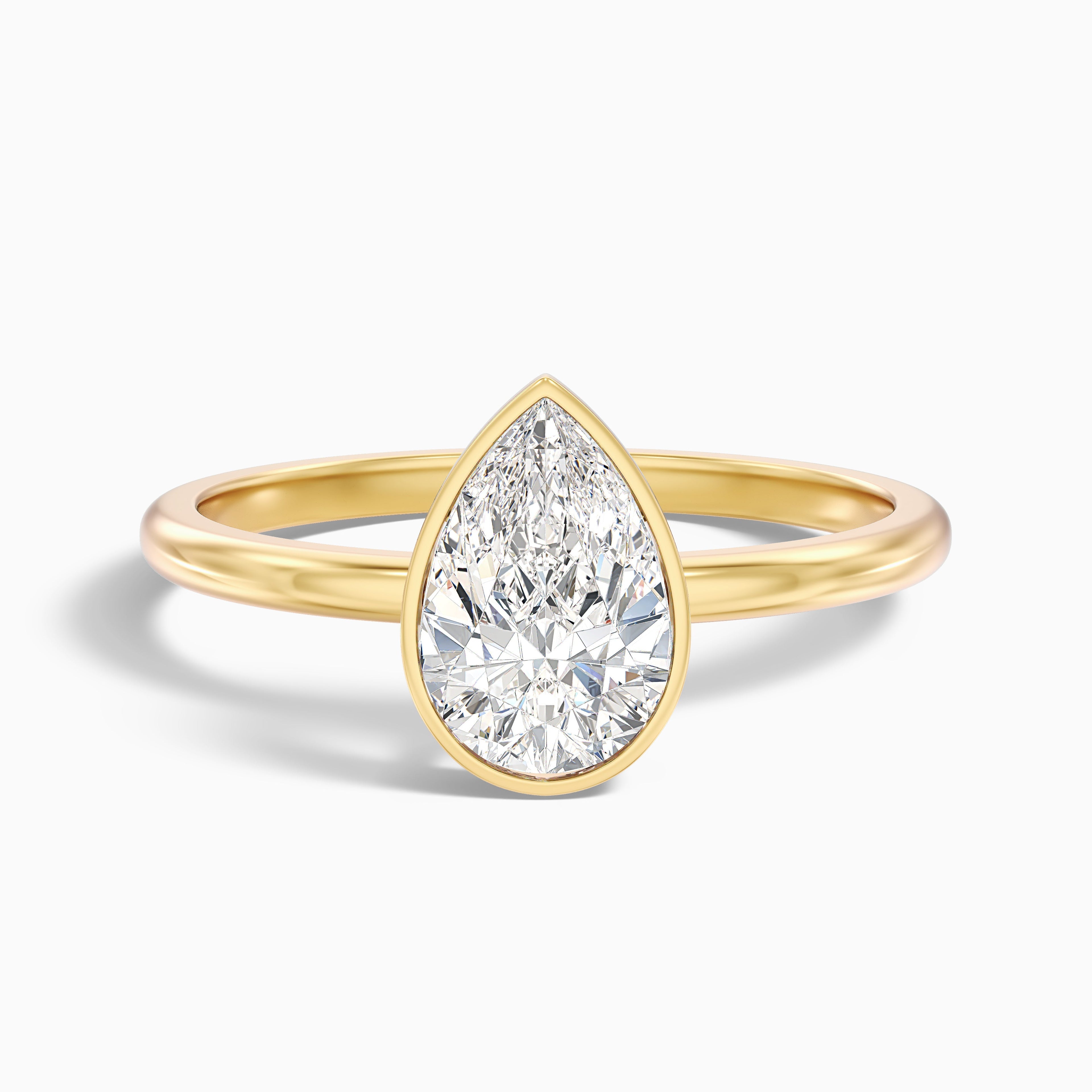 Nasya 1.5 Carat Pear Cut Bezel Set Moissanite Diamond Ring in Platinum