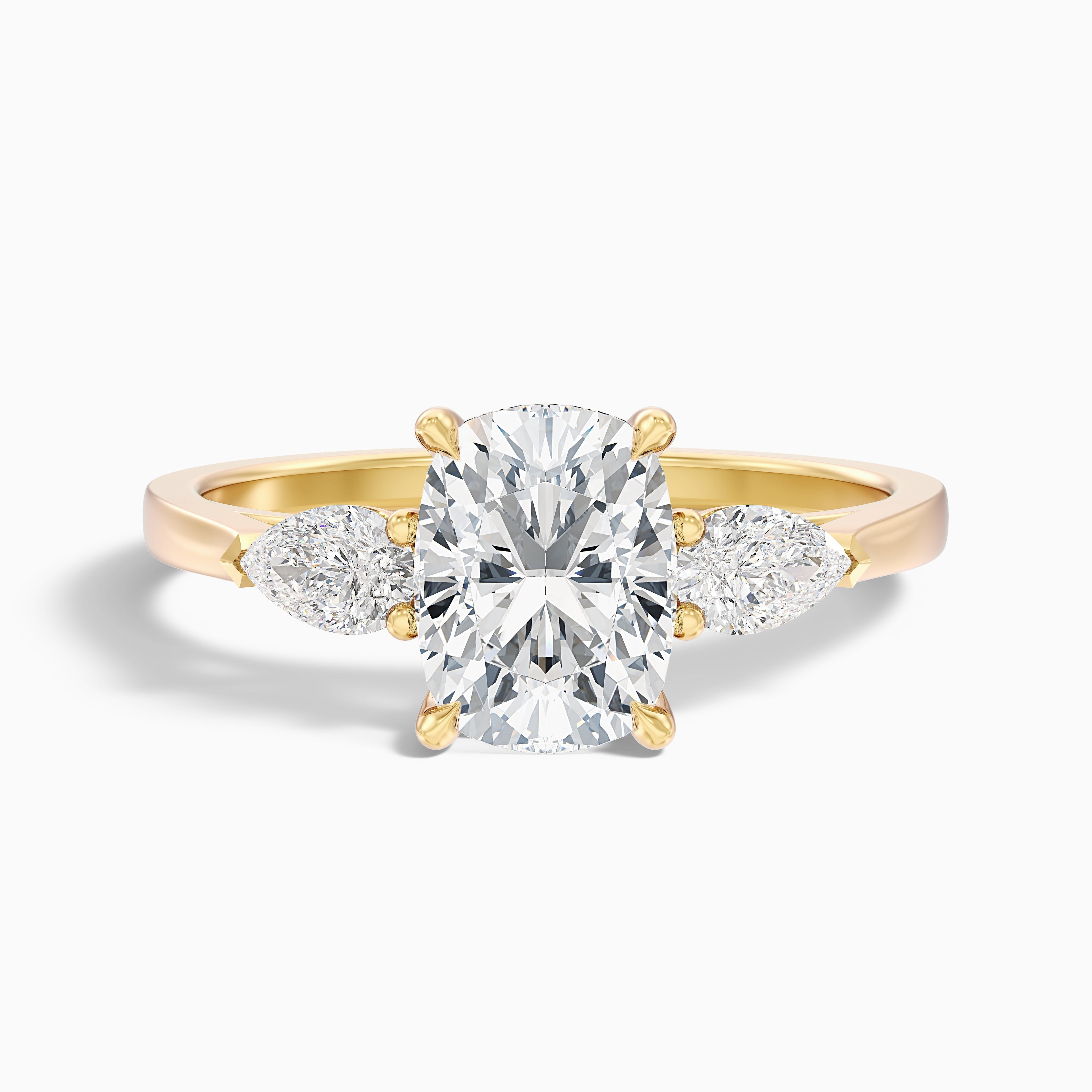 Haley 2.5 Carat Three Stone Ring with Pear Side Stones and an Elongated Cushion Moissanite Diamond in 10k White Gold