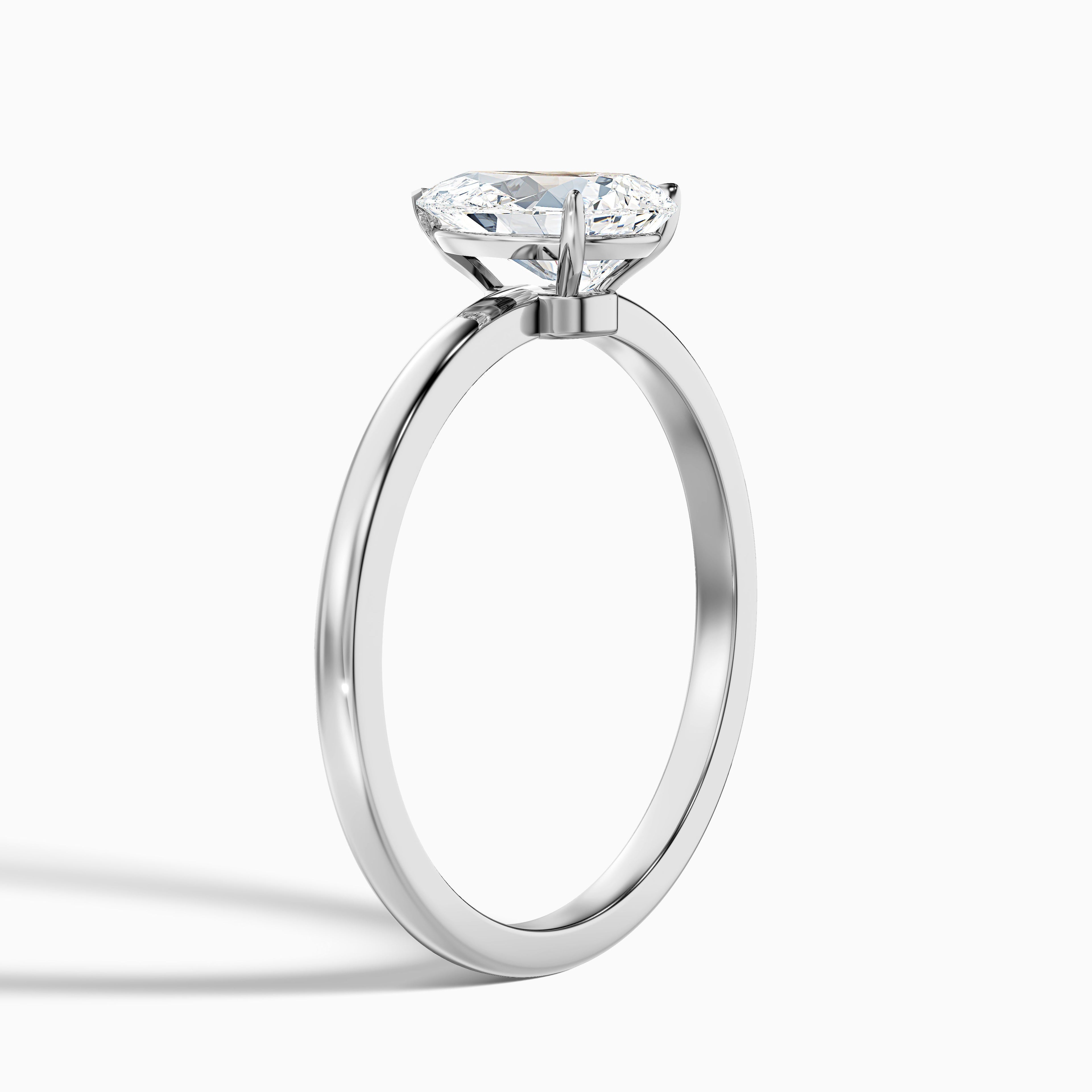 Ainsy 3.5 Carat Pear Cut Low Profile Solitaire Moissanite Diamond Ring in 14k Yellow Gold