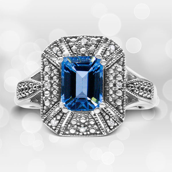 .925 Sterling Silver Diamond Accent and 8X6 mm Emerald-Shape Blue Topaz Ring (I-J Color, I2-I3 Clarity) - Ring Size 7 DestGlow