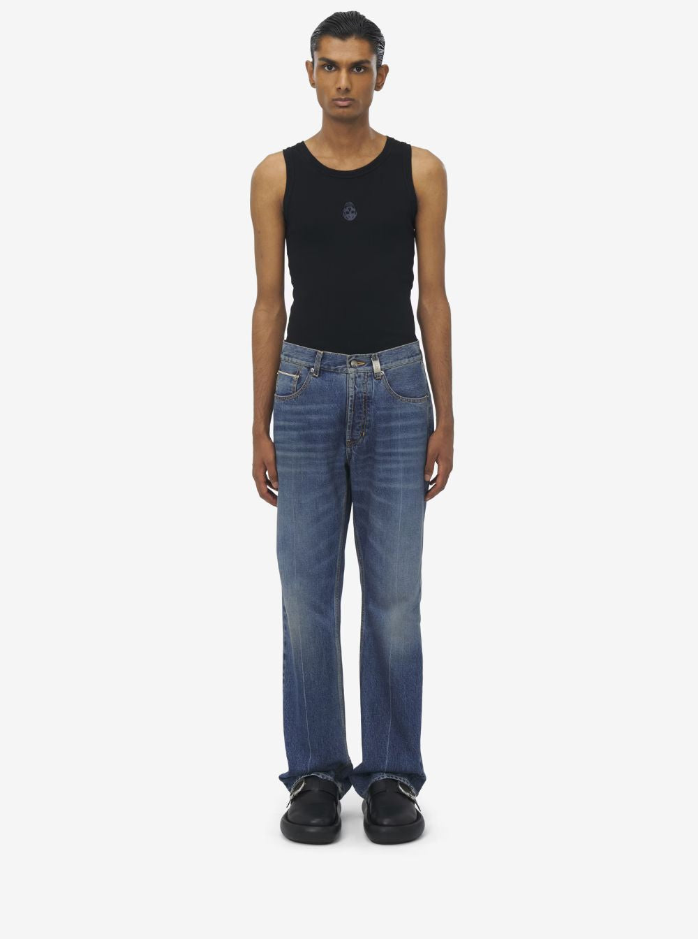 Alexander Mcqueen Men Blue High Waisted Jeans With Logo Detail On The Loop And Logo Patch On The Rear In Denim Man by Luosophy