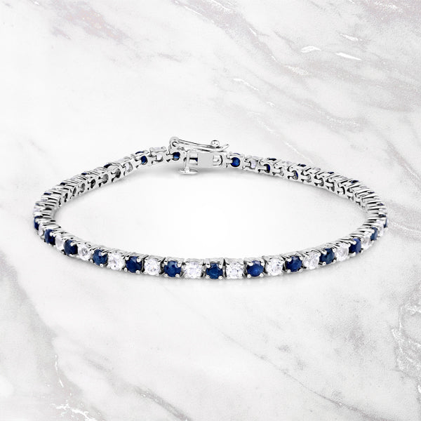 6.87 ct. t.w. Blue Sapphire and White Topaz Bracelet in Sterling Silver by Bids.com