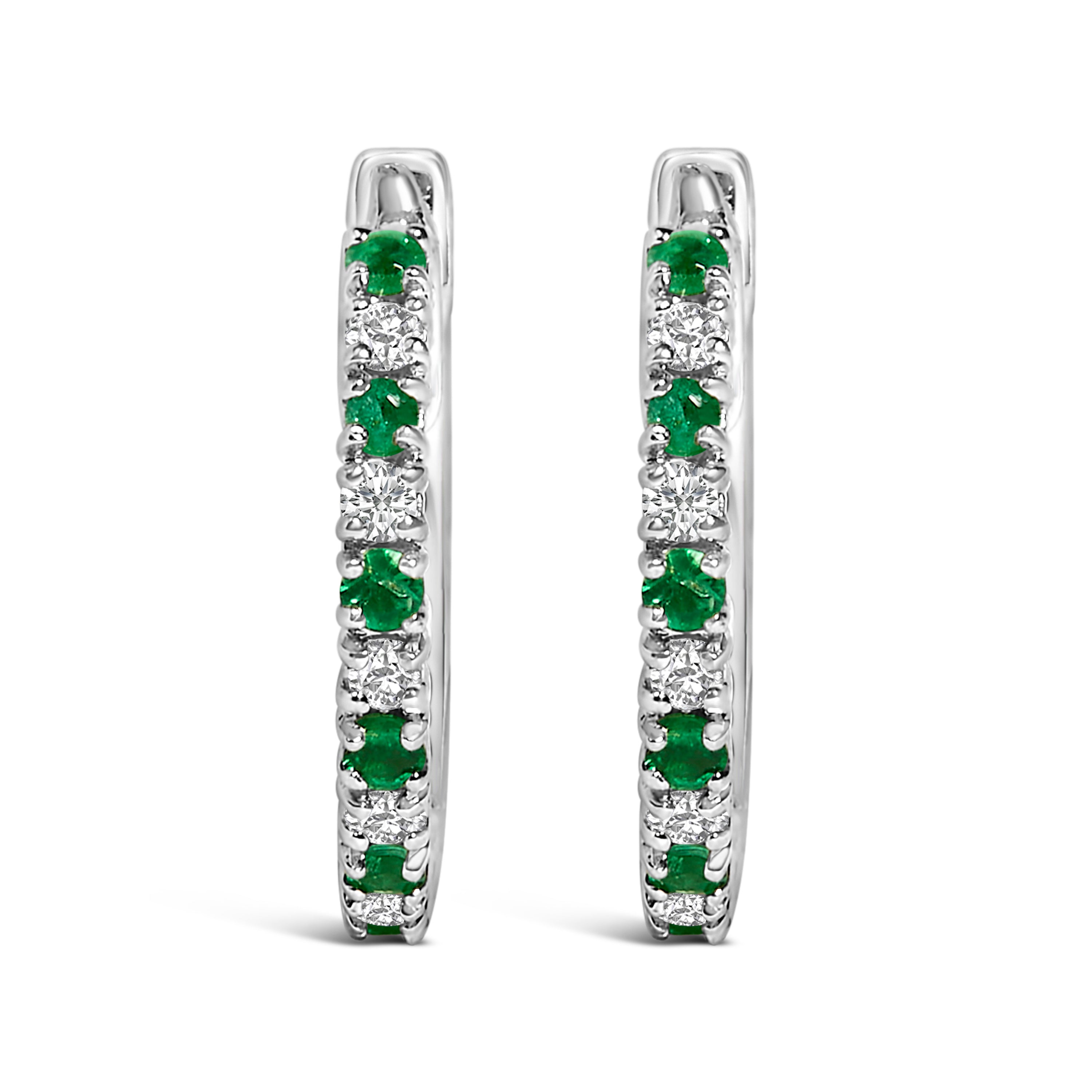 10K White Gold Alternating Emerald 1/10 Cttw Diamond Huggy Hoop Earrings (I-J Color, I1-I2 Clarity) DestGlow