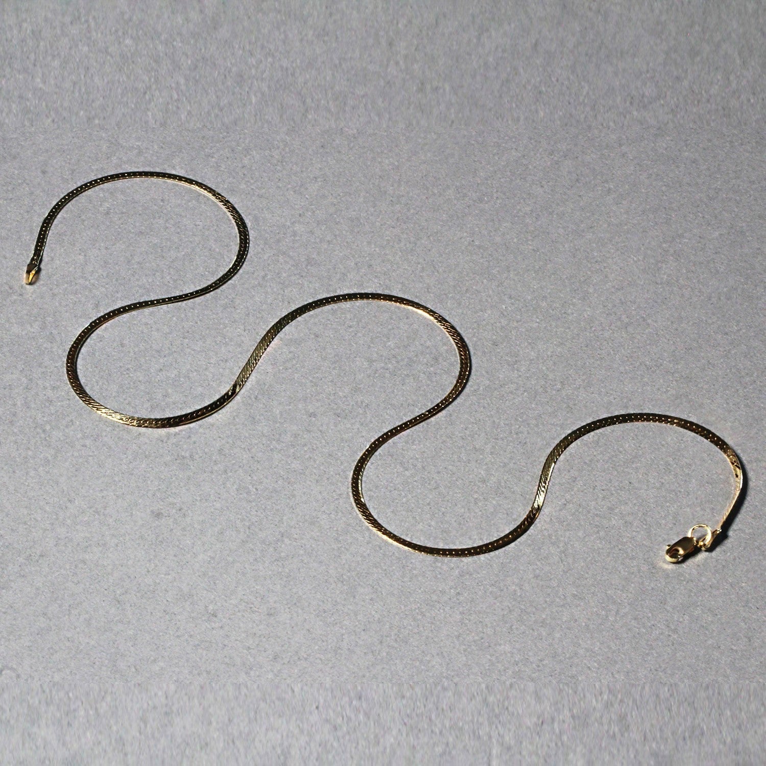 14k Yellow Gold Super Flex Herringbone Chain (1.50 mm) DestGlow