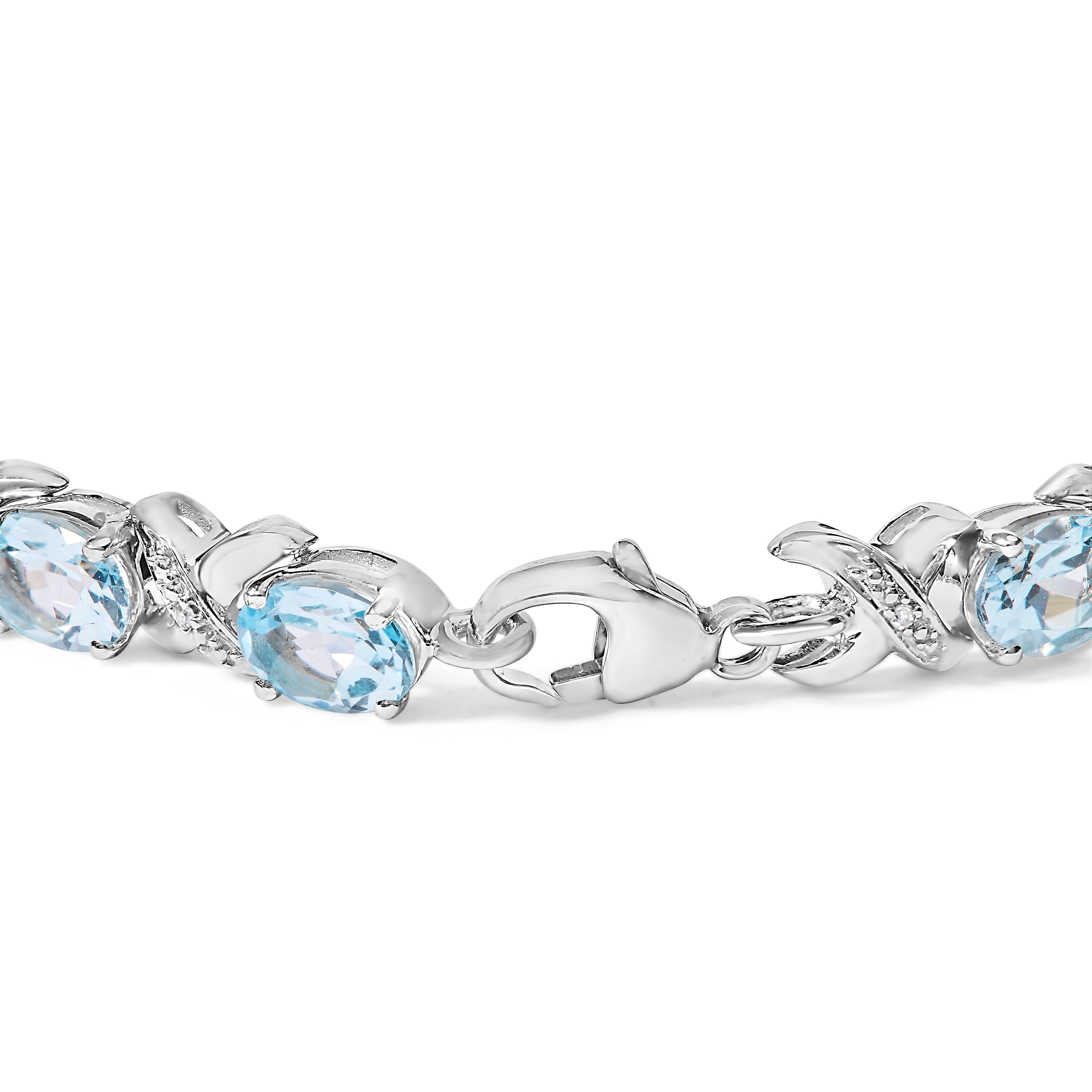 .925 Sterling Silver 16.0 Cttw Oval Blue Topaz and Diamond Accent Tennis X Link Bracelet (I-J Color, I1-I2 Clarity) - Size 7" Inch DestGlow