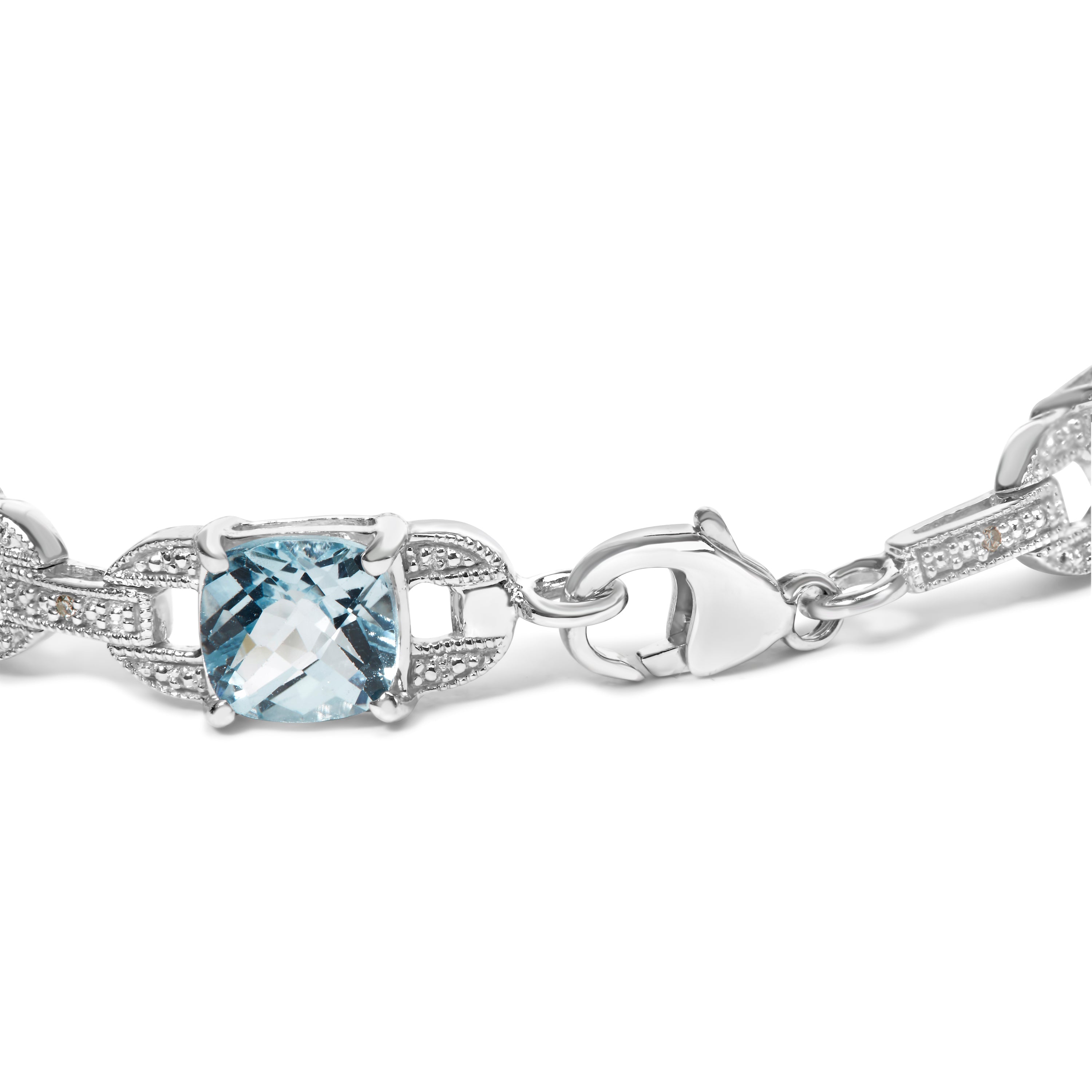 .925 Sterling Silver 7x7 mm Cushion Cut Blue Topaz and 1/20 cttw Round Cut Diamond Fashion Tennis Bracelet (I-J Color, I1-I2 Clarity) - 7" DestGlow