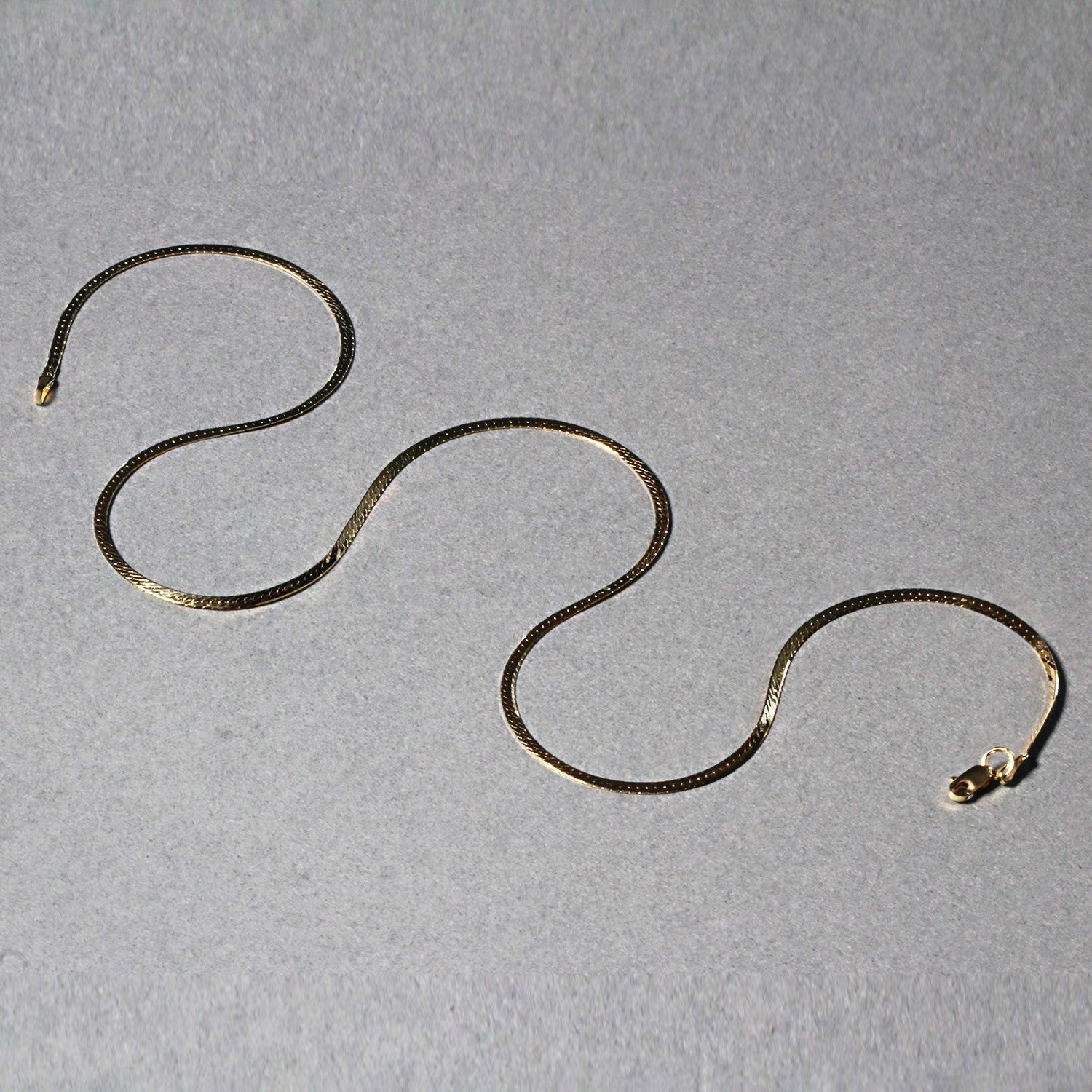 14k Yellow Gold Super Flex Herringbone Chain (1.50 mm) DestGlow