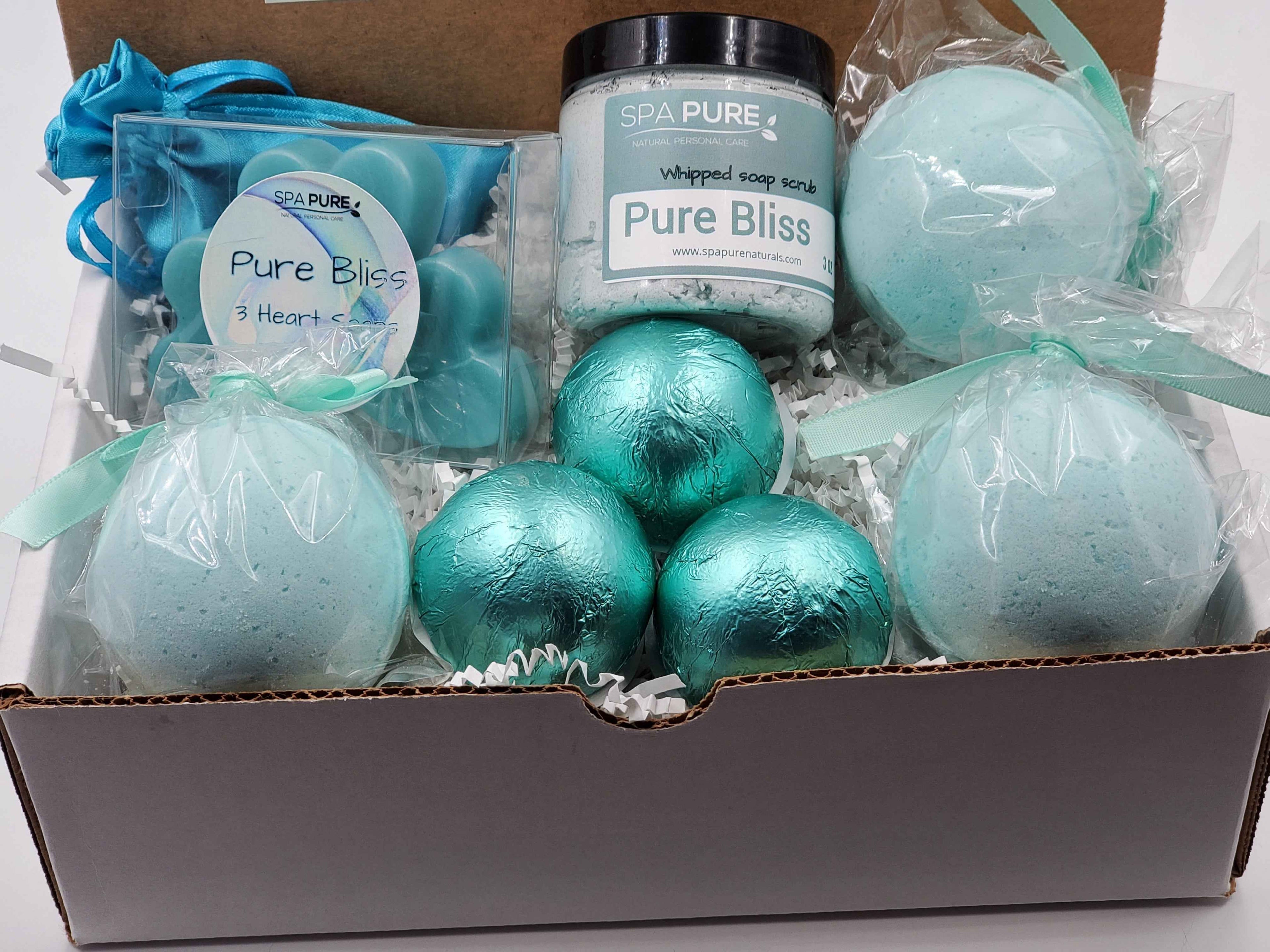 Spa Pure Luxury Spa Kit - Pure Bliss - 3 XL Pure Bliss Bath Fizzies, 3 Pure Bliss shower steamers, 3 Heart-shaped soaps, one 3.5 oz Pure Bliss whipped soap scrub, 1 Roll-on Perfume, Perfect for a mini-spa treatment.