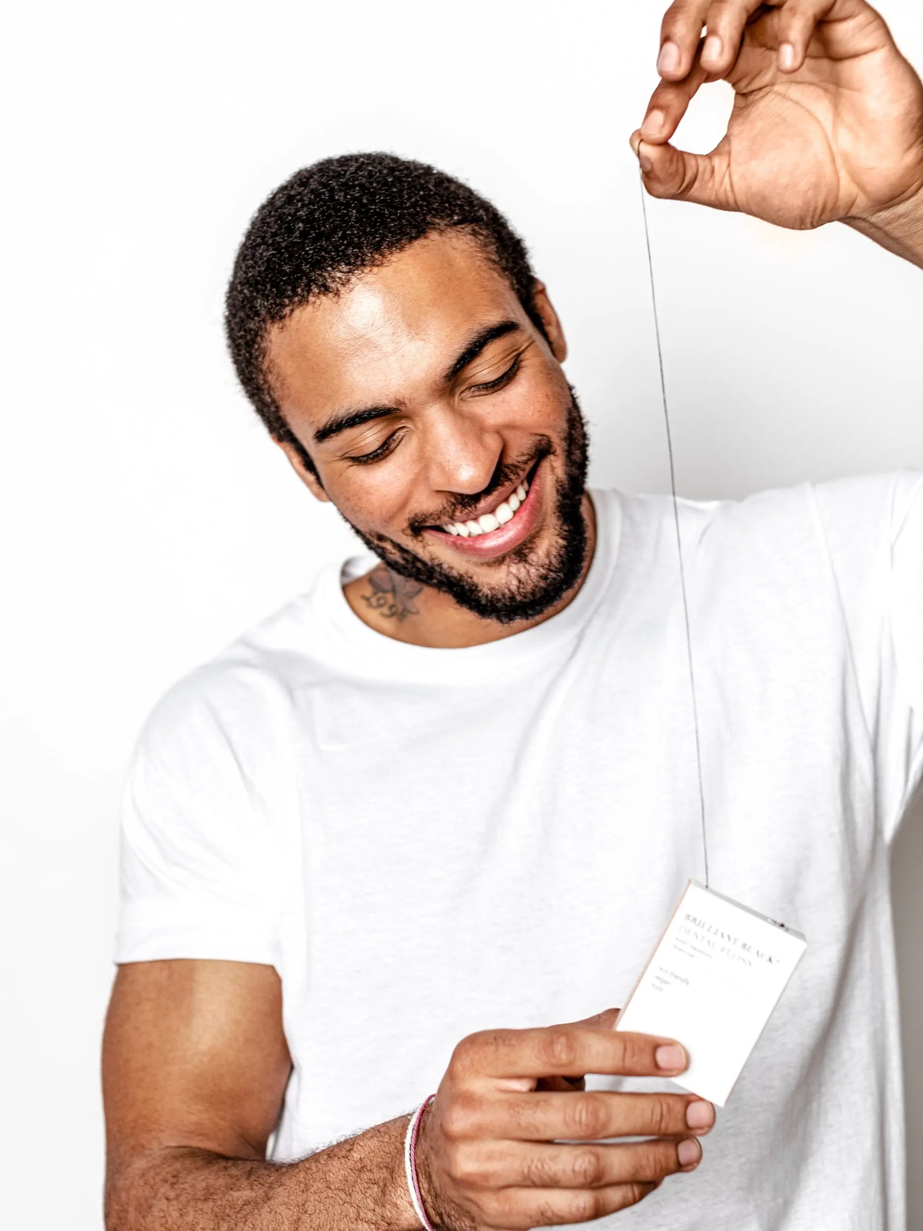 Brilliant Black® Floss – Whitens Between Teeth Naturally by Terra & Co.