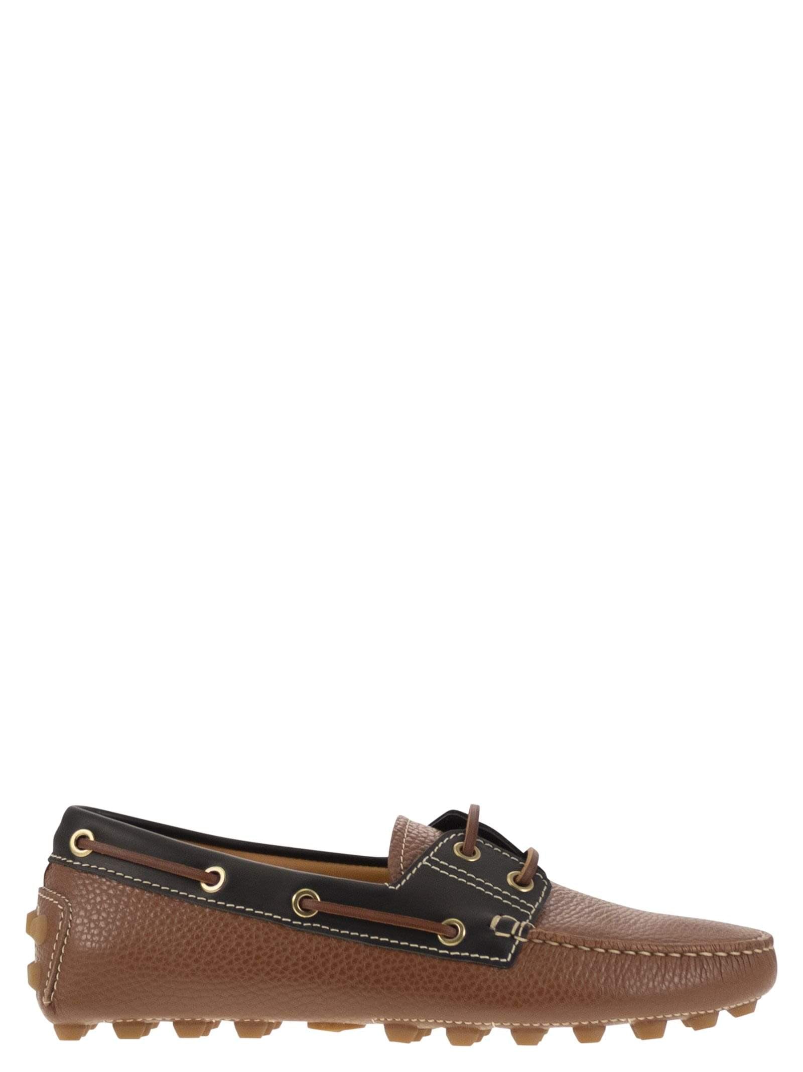 Tods women leather boat bubble grommet
