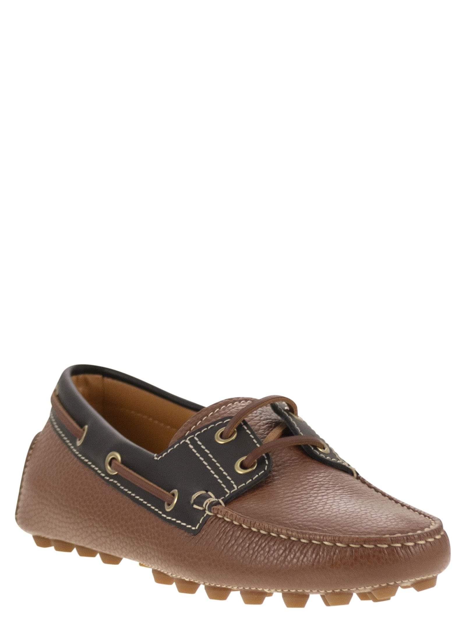 Tods women leather boat bubble grommet