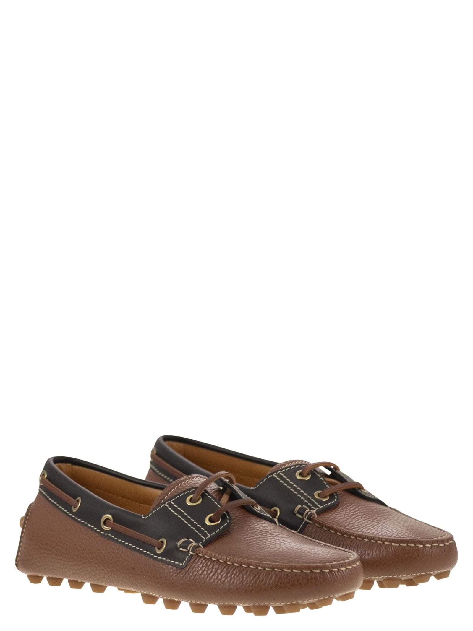 Tods women leather boat bubble grommet