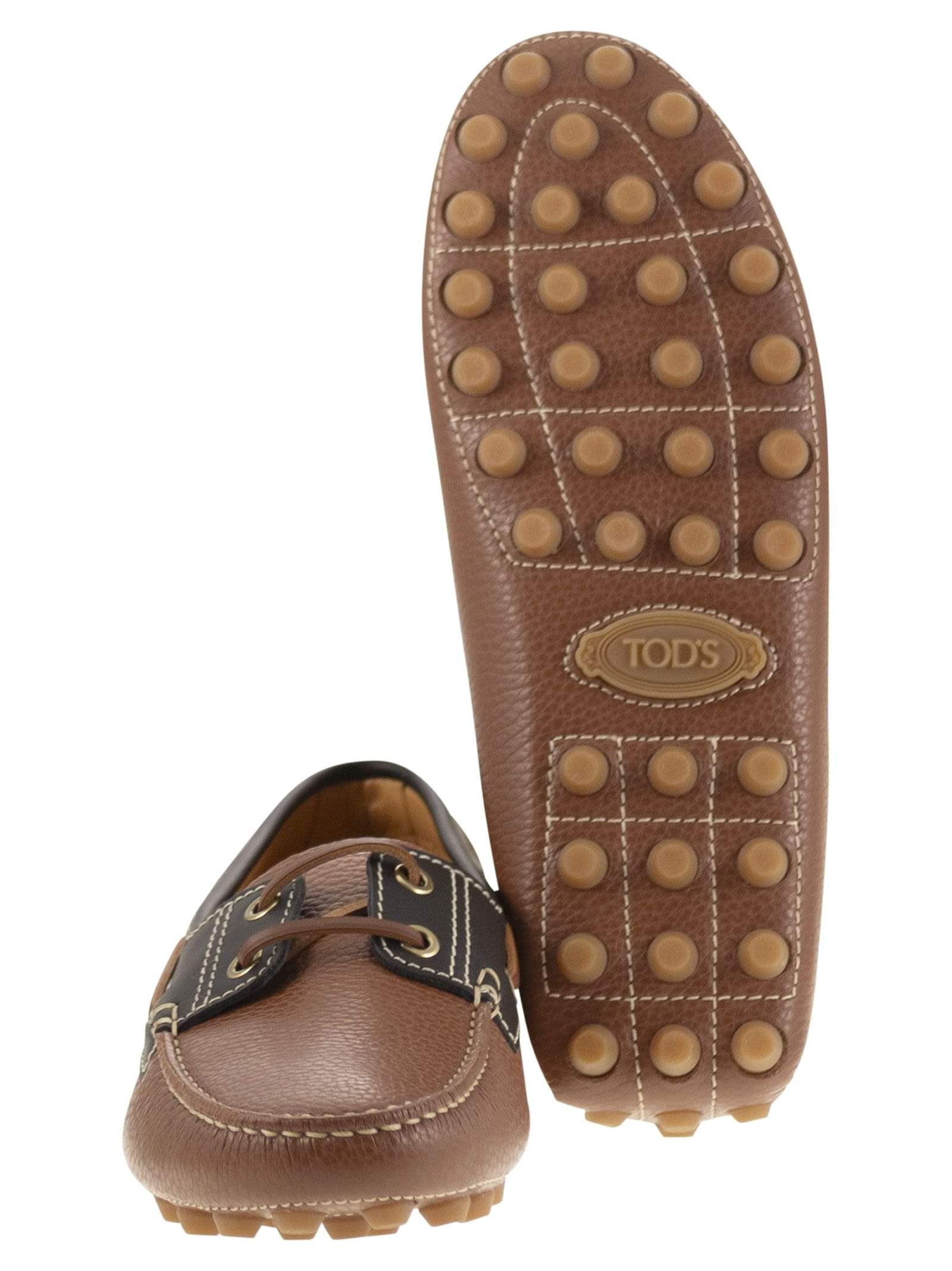 Tods women leather boat bubble grommet
