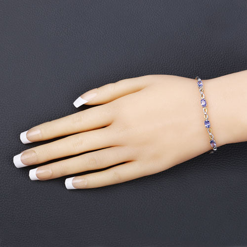 1.81 Carat Genuine Tanzanite and White Topaz .925 Sterling Silver Bracelet by Bids.com