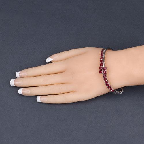 9.10 Carat Glass Filled Ruby .925 Sterling Silver Bangle by Bids.com