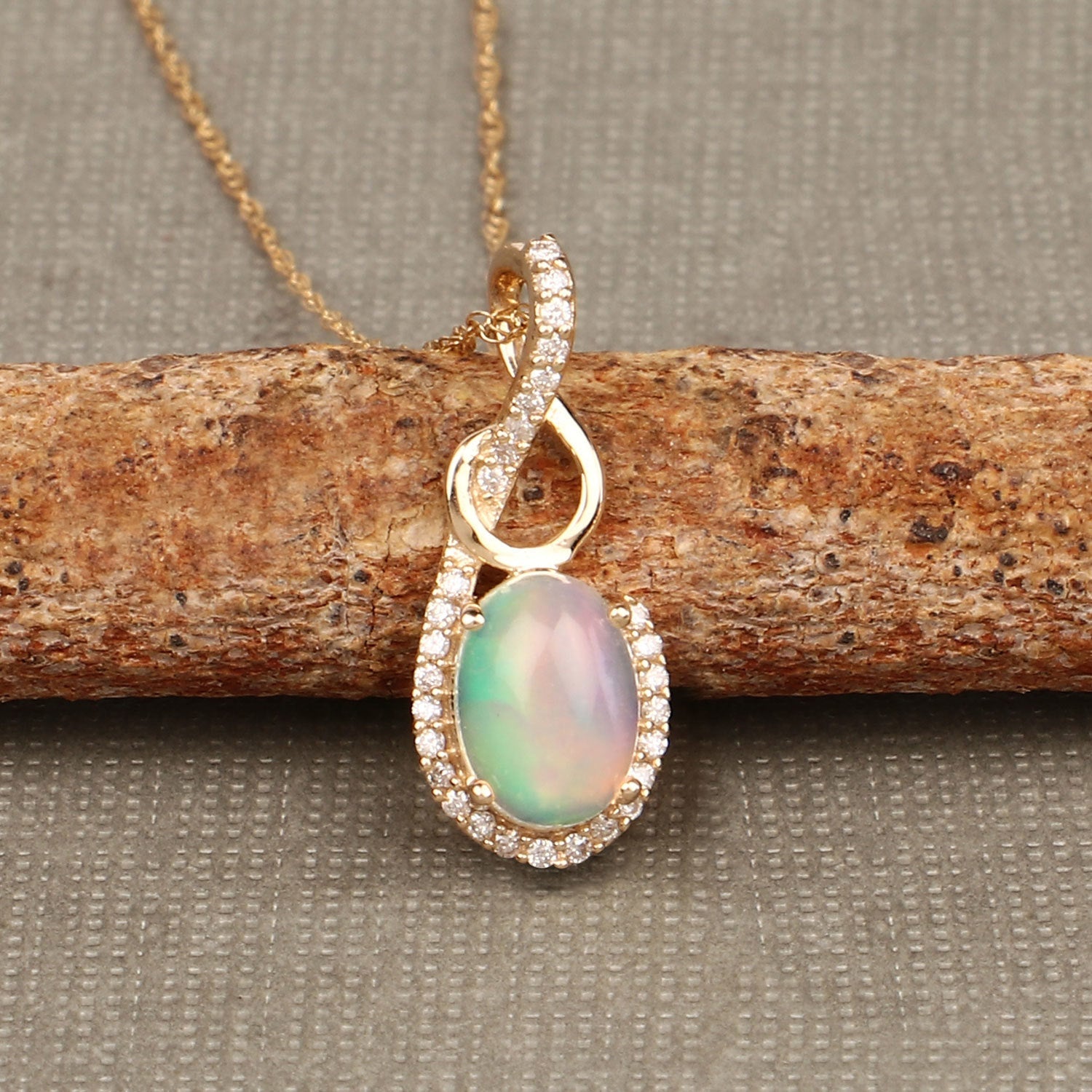 0.56 Carat Genuine Ethiopian Opal and White Diamond 14K Yellow Gold Pendant DestGlow