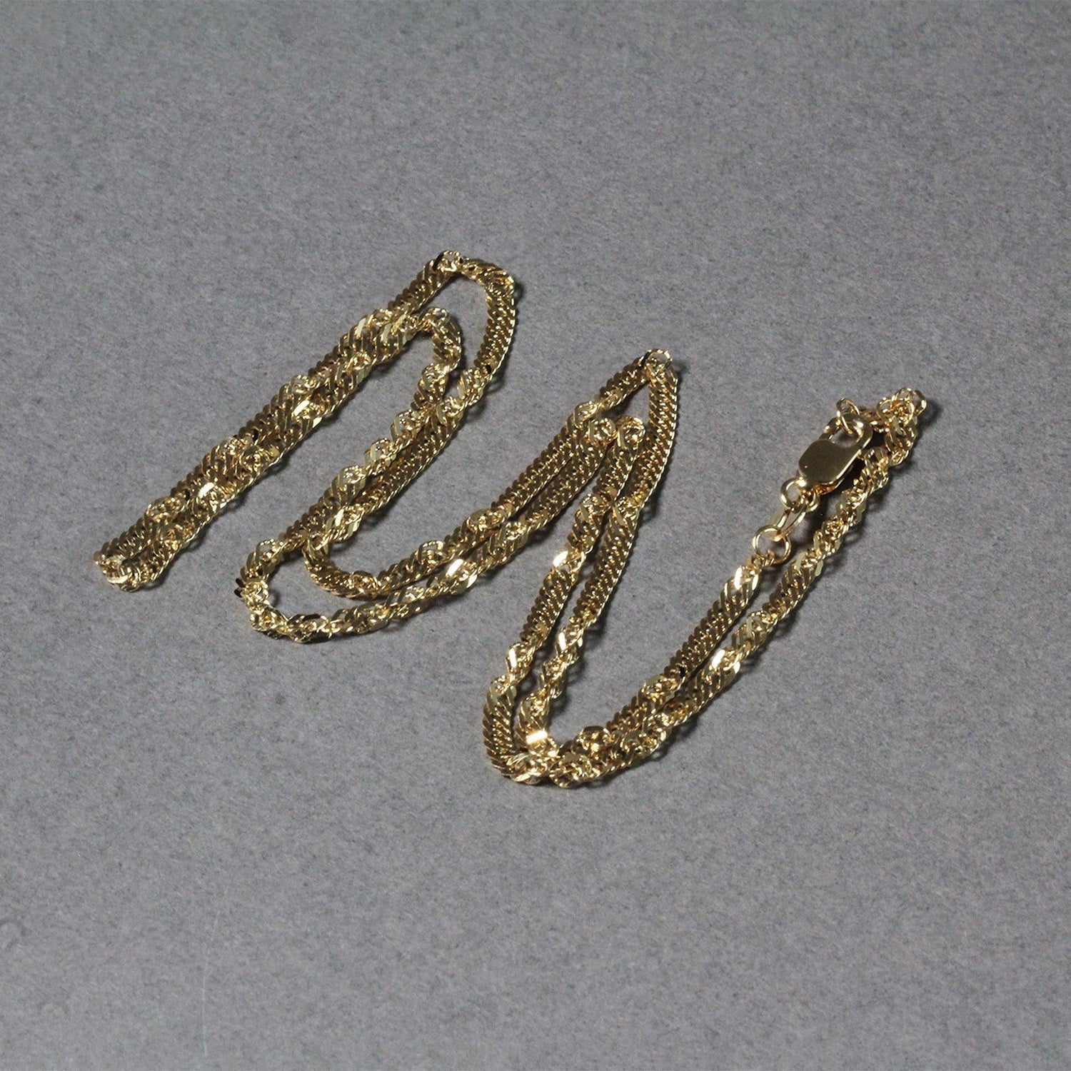 2.1mm 14k Yellow Gold Singapore Chain by Bids.com