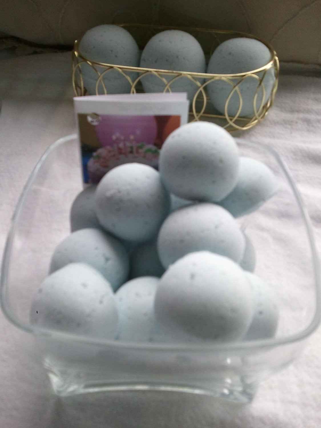 14 bath bombs (select from over 100 fragrances) our Little Bag of Balls (great for dry skin)