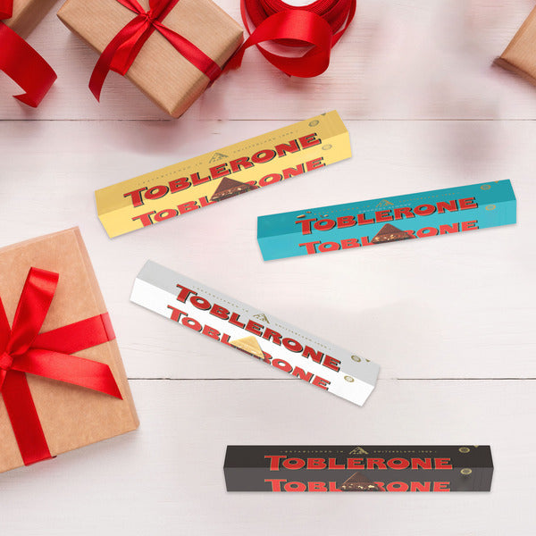 TOBLERONE Milk Chocolate Bar With Salted Caramelized Almonds And Honey And Almond Nougat 3.53 oz