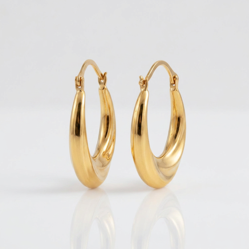 14k Yellow Gold Graduated Oval Hoop Earrings DestGlow