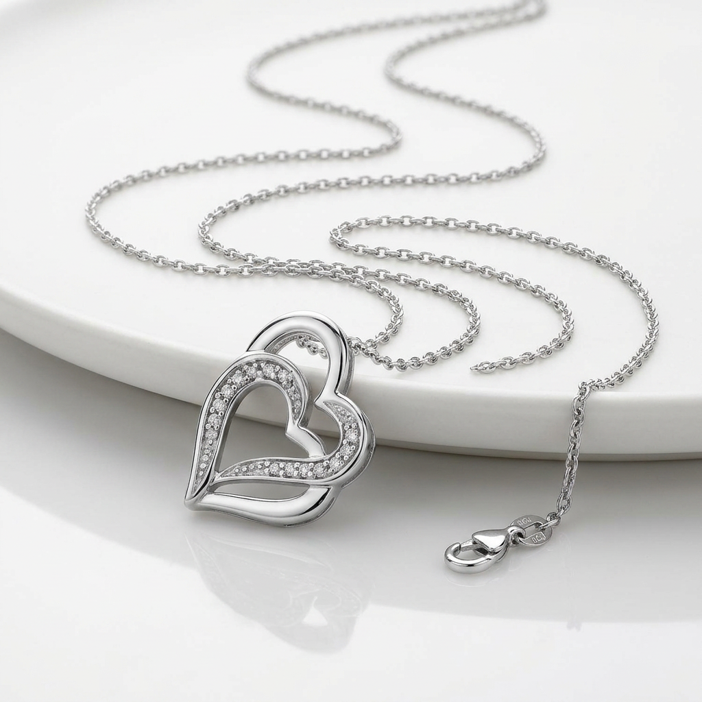 Sterling Silver Dual Heart Motif Pendant with Diamonds (.06 cttw)