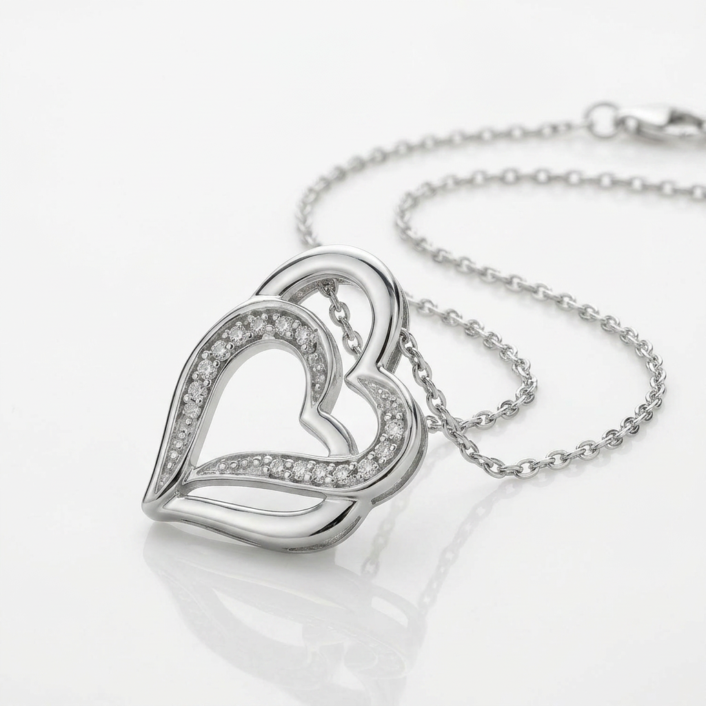 Sterling Silver Dual Heart Motif Pendant with Diamonds (.06 cttw)