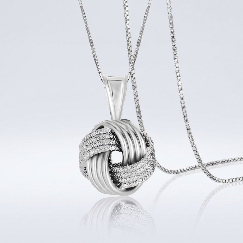 Sterling Silver Pendant with a Ridge Textured Love Knot Design