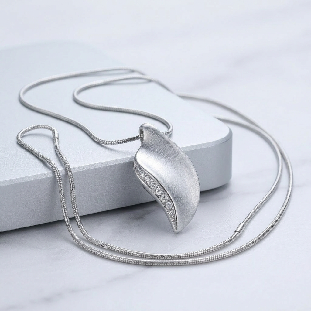 Avera Crystal Leaf Necklace in Polished Silver DestGlow