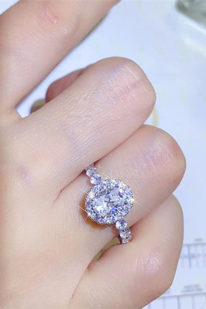 Adored 1 Carat Oval-Cut Sparkala™ Platinum Over Pure Sterling Silver Halo Ring by Sparkala