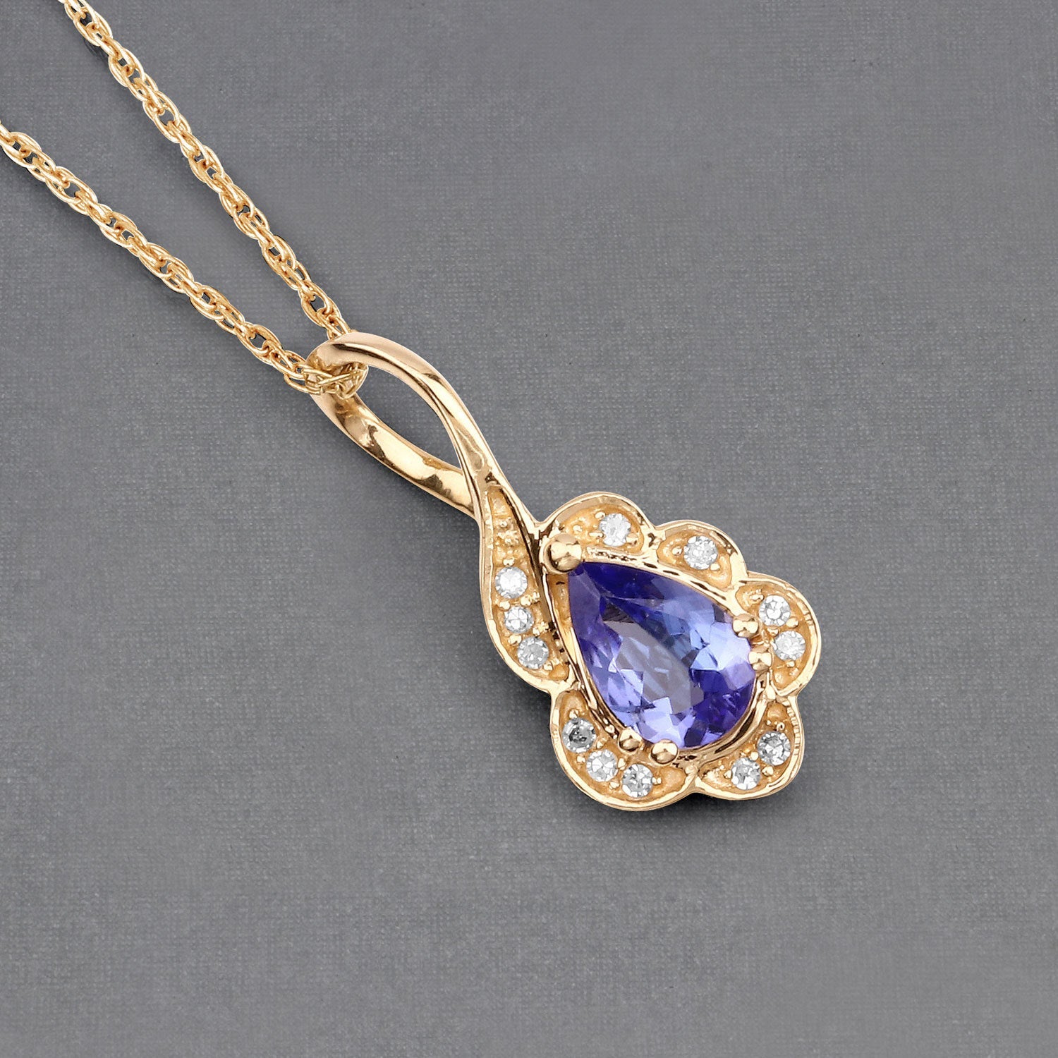 0.40 Carat Genuine Tanzanite and White Diamond 14K Yellow Gold Pendant by Bids.com