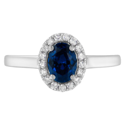 10K White Gold 1/5 Cttw Round Diamond and Prong Set 7MM Created Blue Sapphire Halo Cocktail Ring (H-I Color, I1-I2 Clarity) - Size 7 by Bids.com