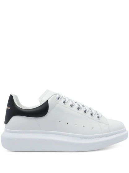 Alexander Mcqueen Men Oversized Sneakers In White/Black by Luosophy