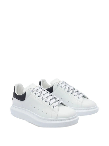 Alexander Mcqueen Men Oversized Sneakers In White/Black by Luosophy