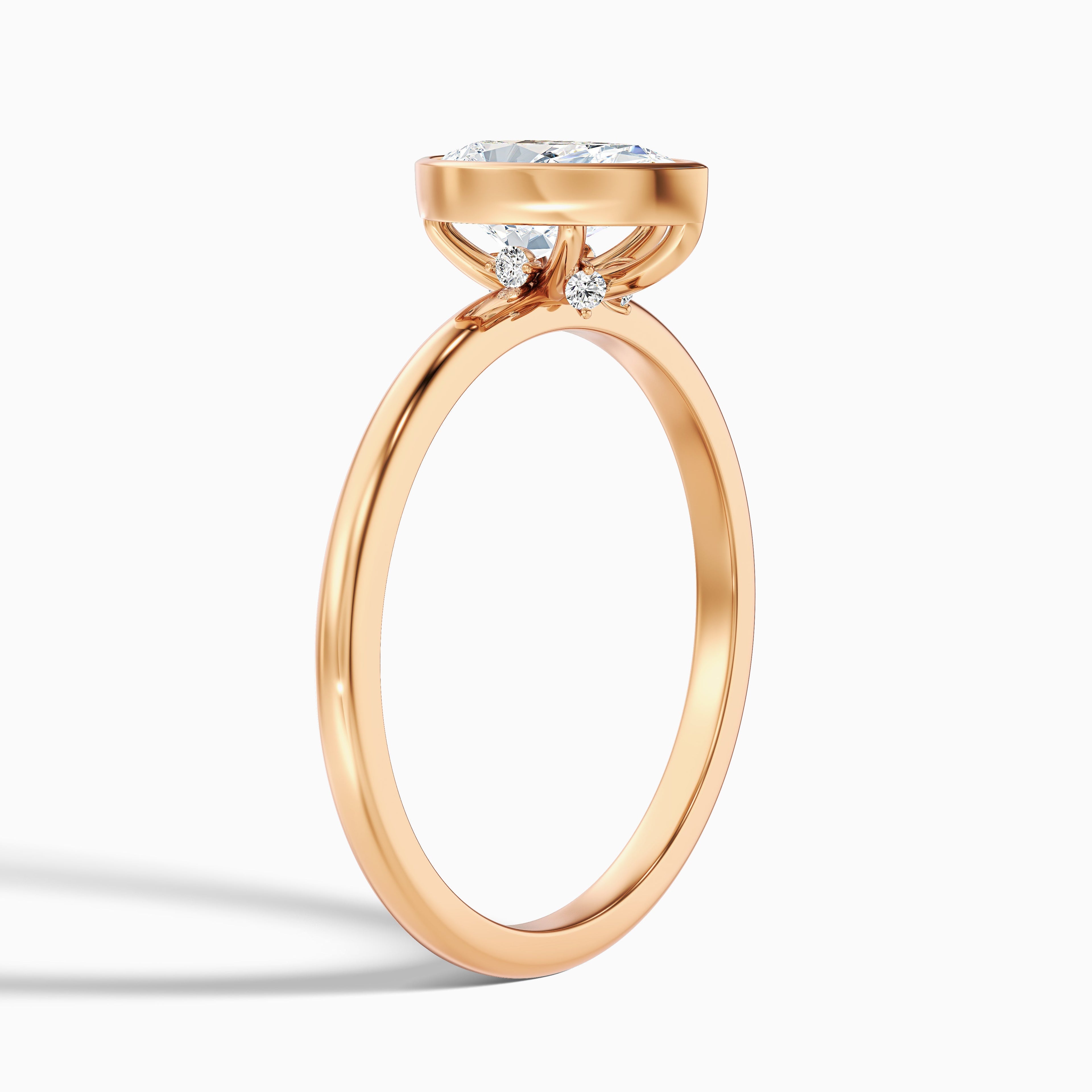 Nasya 4.5 Carat Pear Cut Bezel Set Moissanite Diamond Ring in 10k Rose Gold