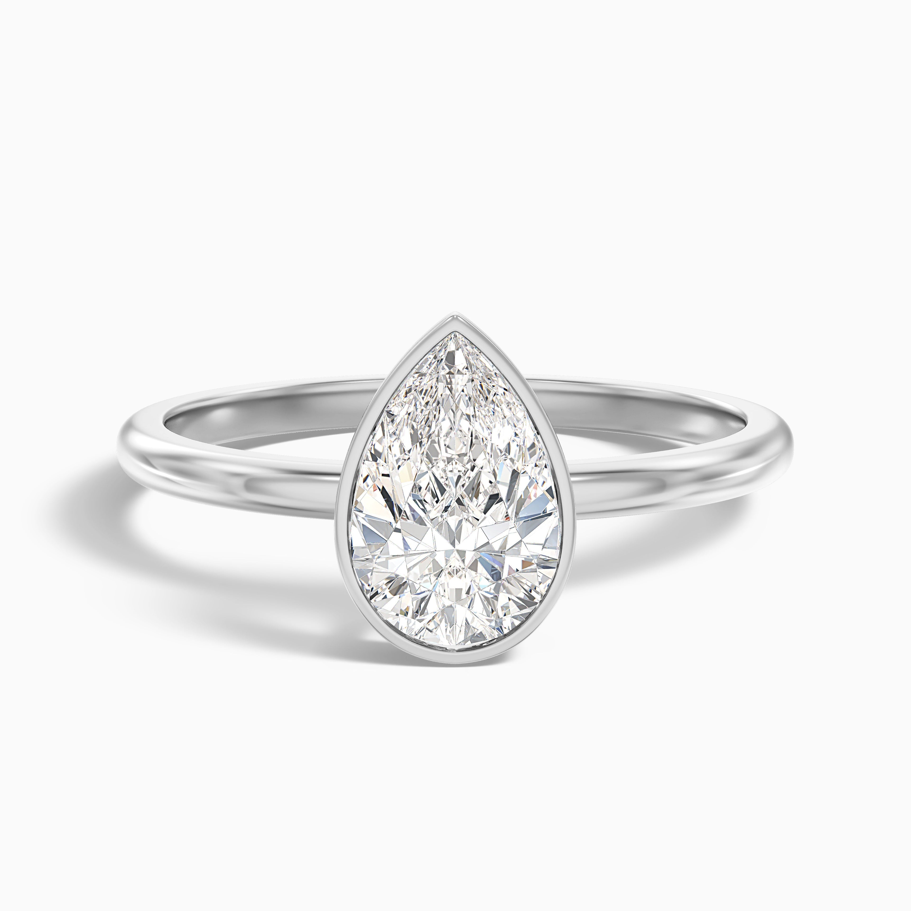 Nasya 1 Carat Pear Cut Bezel Set Moissanite Diamond Ring in 10k Yellow Gold