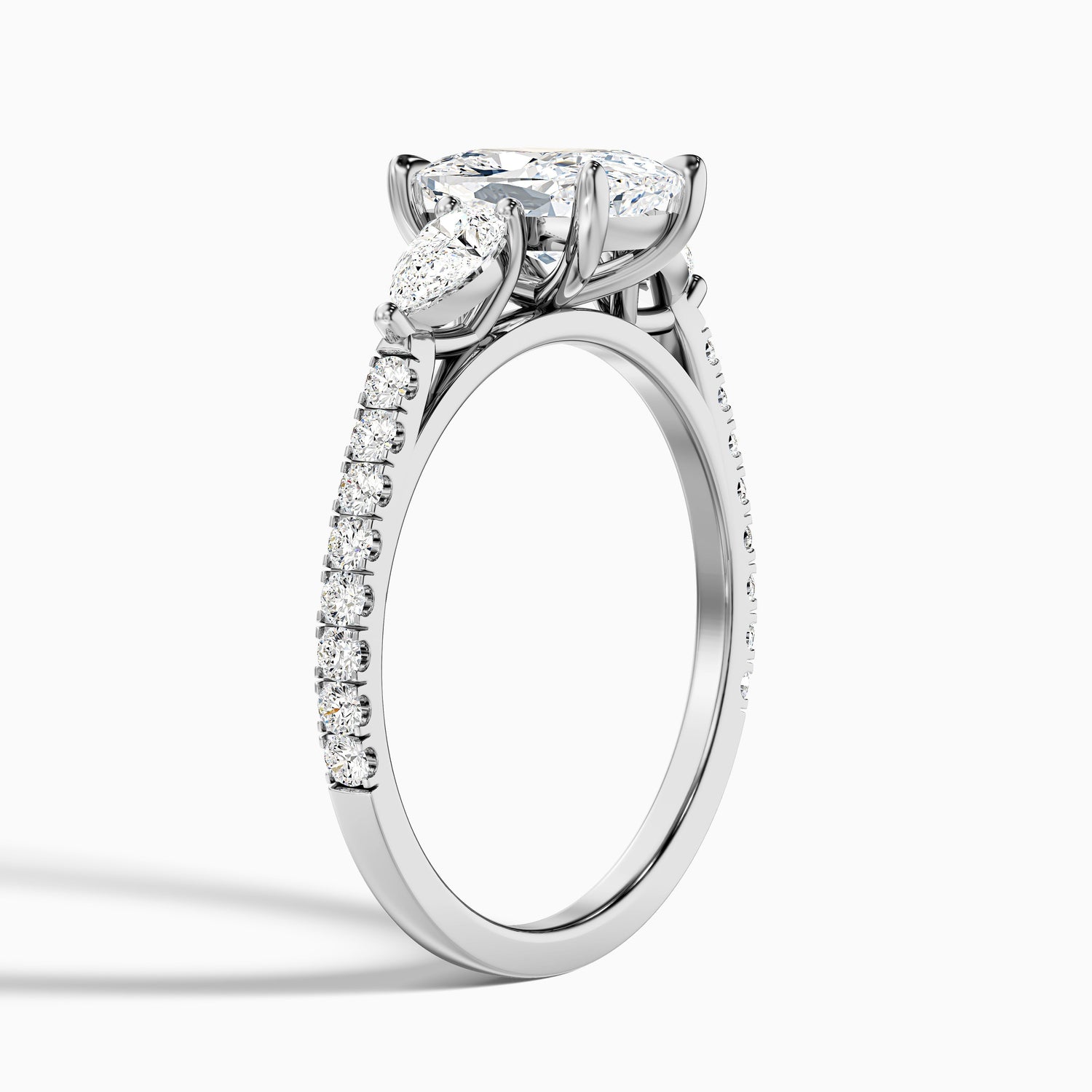 Ivana 4.5 Carat Three Stone Pave Ring with Pear Side Stones and an Elongated Cushion Lab Grown Diamond in 10k White Gold