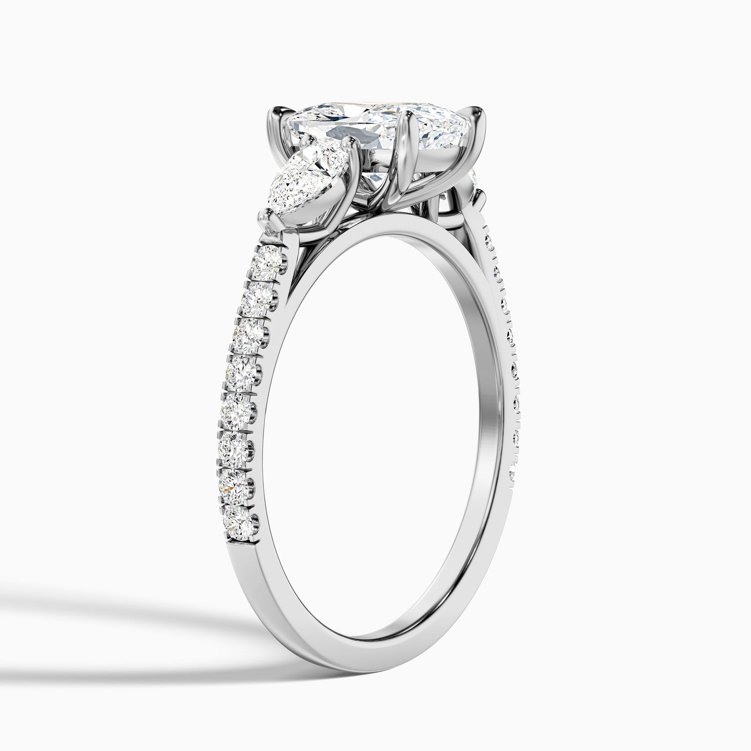 Ivana 2.5 Carat Three Stone Pave Ring with Pear Side Stones and an Elongated Cushion Lab Grown Diamond in 925 Sterling Silver