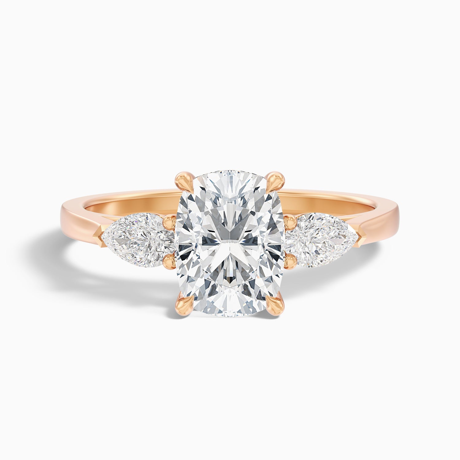 Haley 2 Carat Three Stone Ring with Pear Side Stones and an Elongated Cushion Moissanite Diamond in 18k Yellow Gold