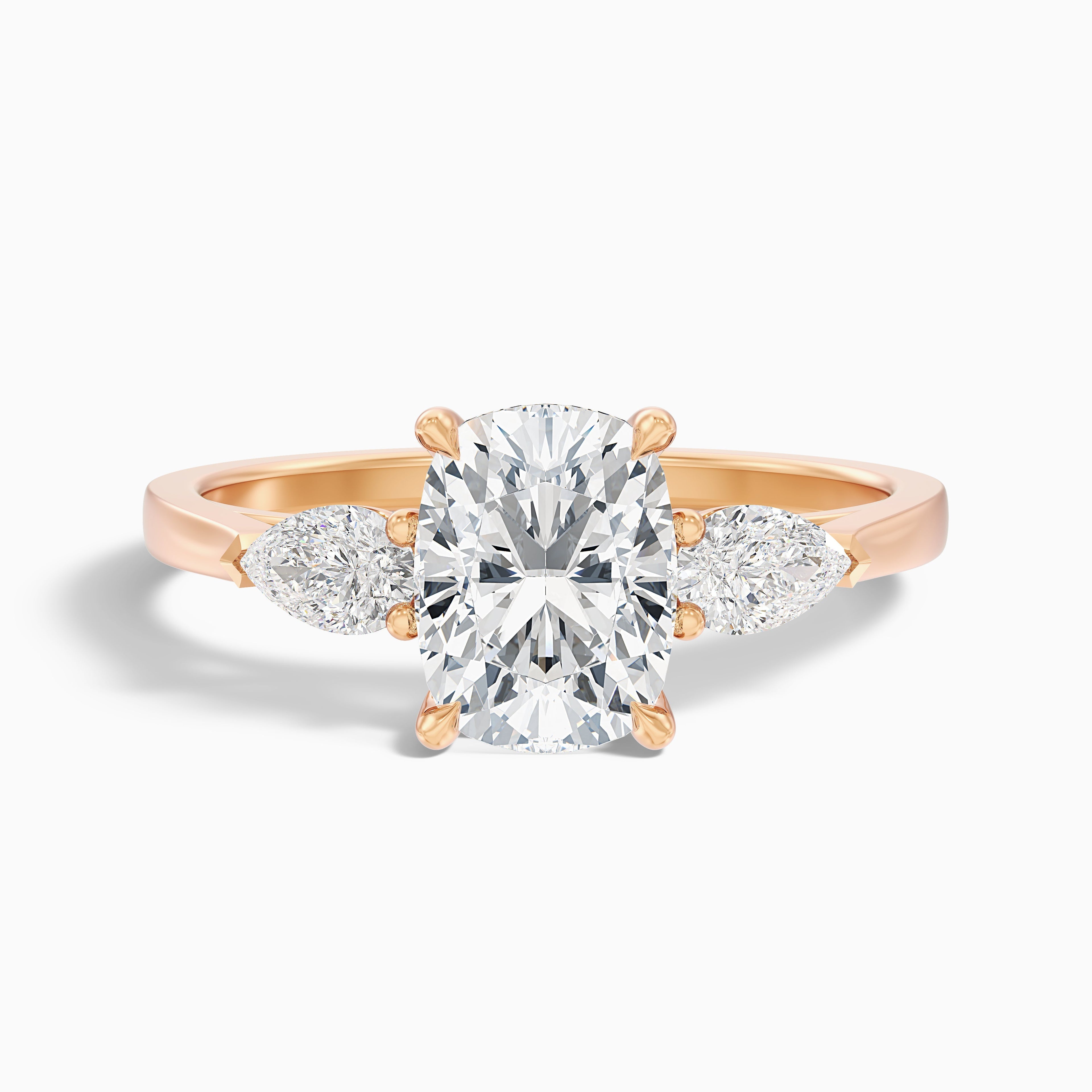 Haley 3.5 Carat Three Stone Ring with Pear Side Stones and an Elongated Cushion Moissanite Diamond in 10k Yellow Gold