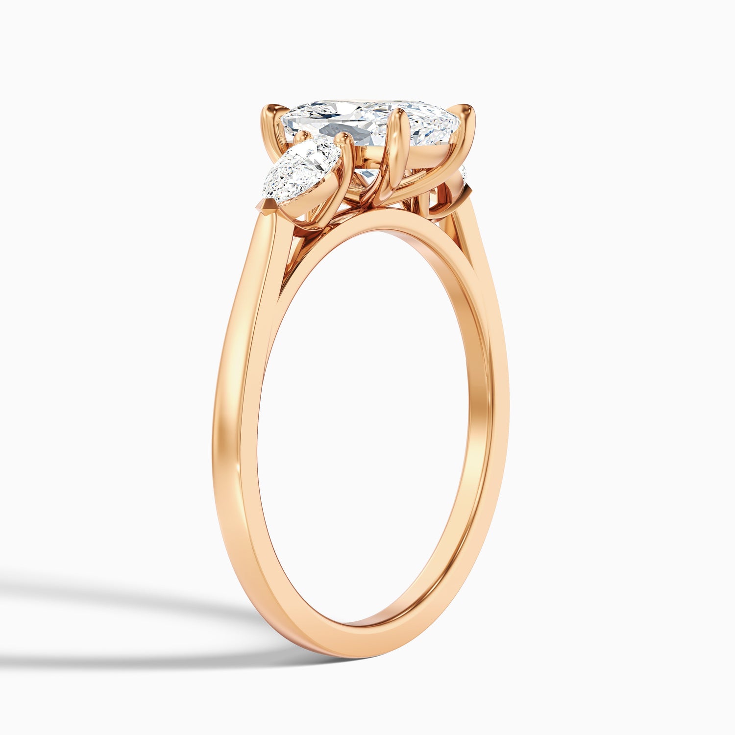 Haley 5.5 Carat Three Stone Ring with Pear Side Stones and an Elongated Cushion Moissanite Diamond in 14k Yellow Gold