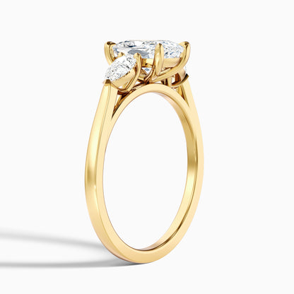 Haley 2 Carat Three Stone Ring with Pear Side Stones and an Elongated Cushion Lab Grown Diamond in 10k Yellow Gold