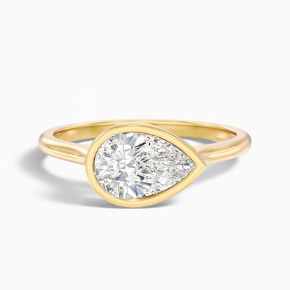 Noele 1.5 Carat Pear Cut East West Bezel Moissanite Diamond Ring in 14k Yellow Gold