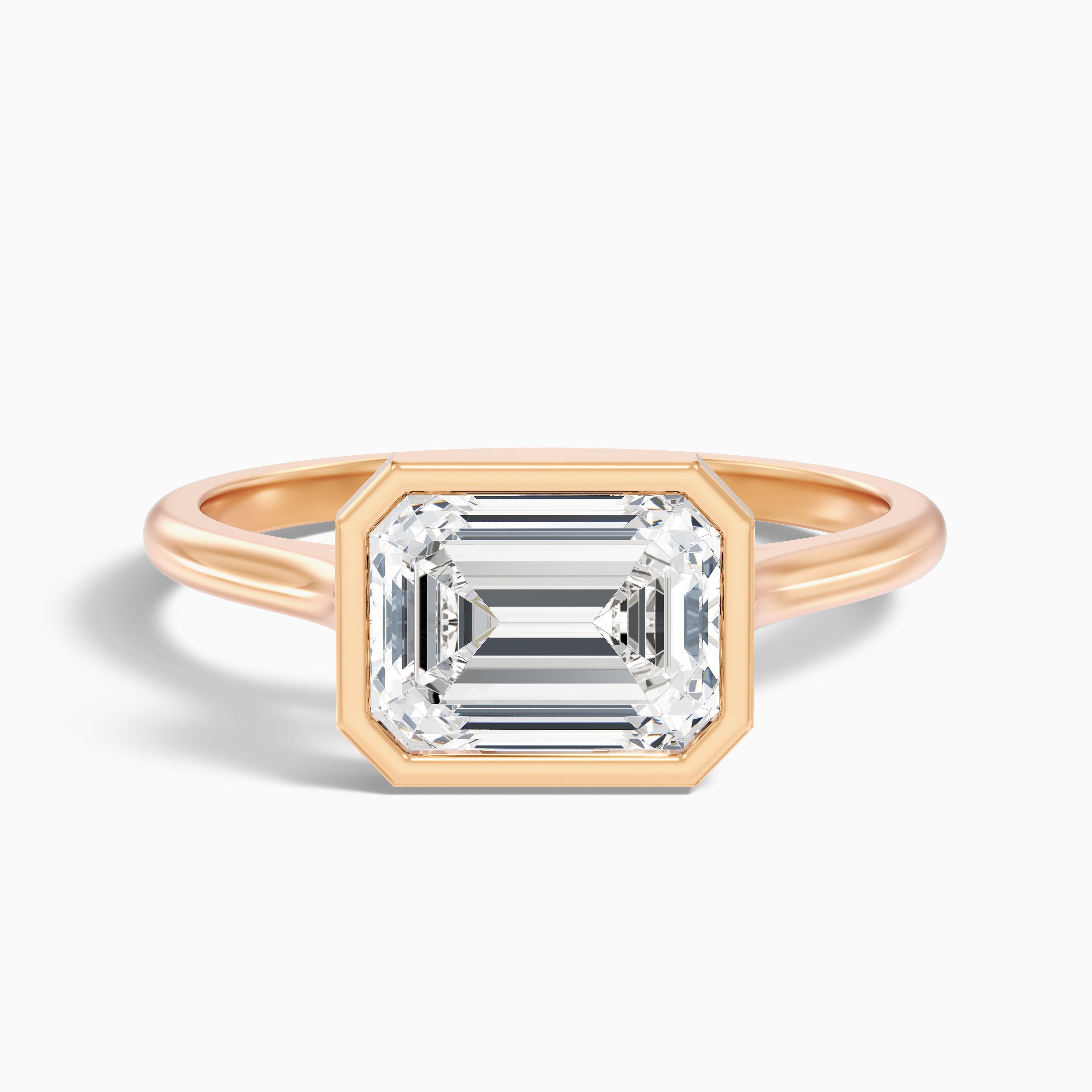 Kelsey 1.5 Carat Emerald East West Bezel Moissanite Diamond Ring In 14k Yellow Gold